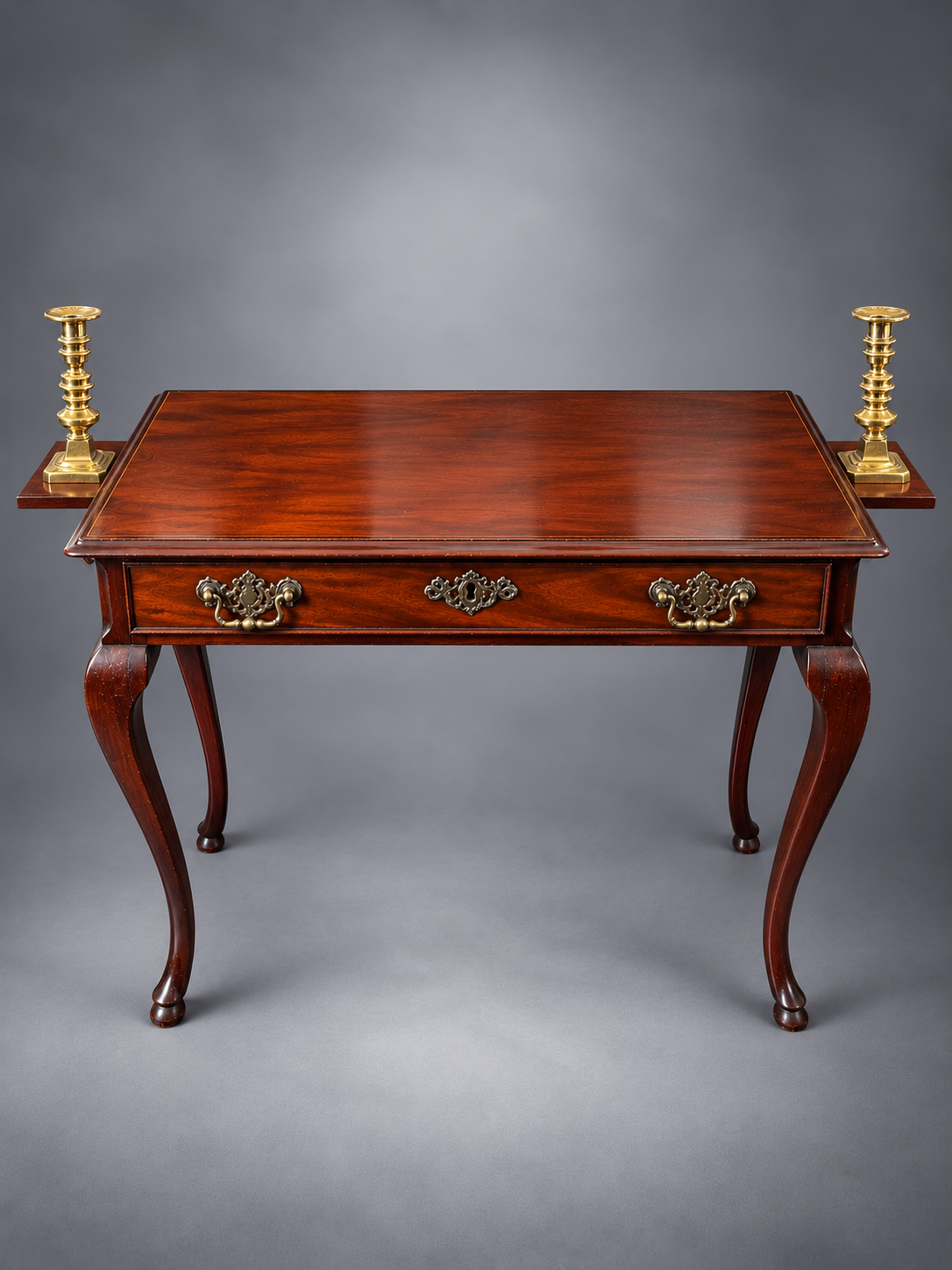 Antique Table with Brass Candlesticks.png