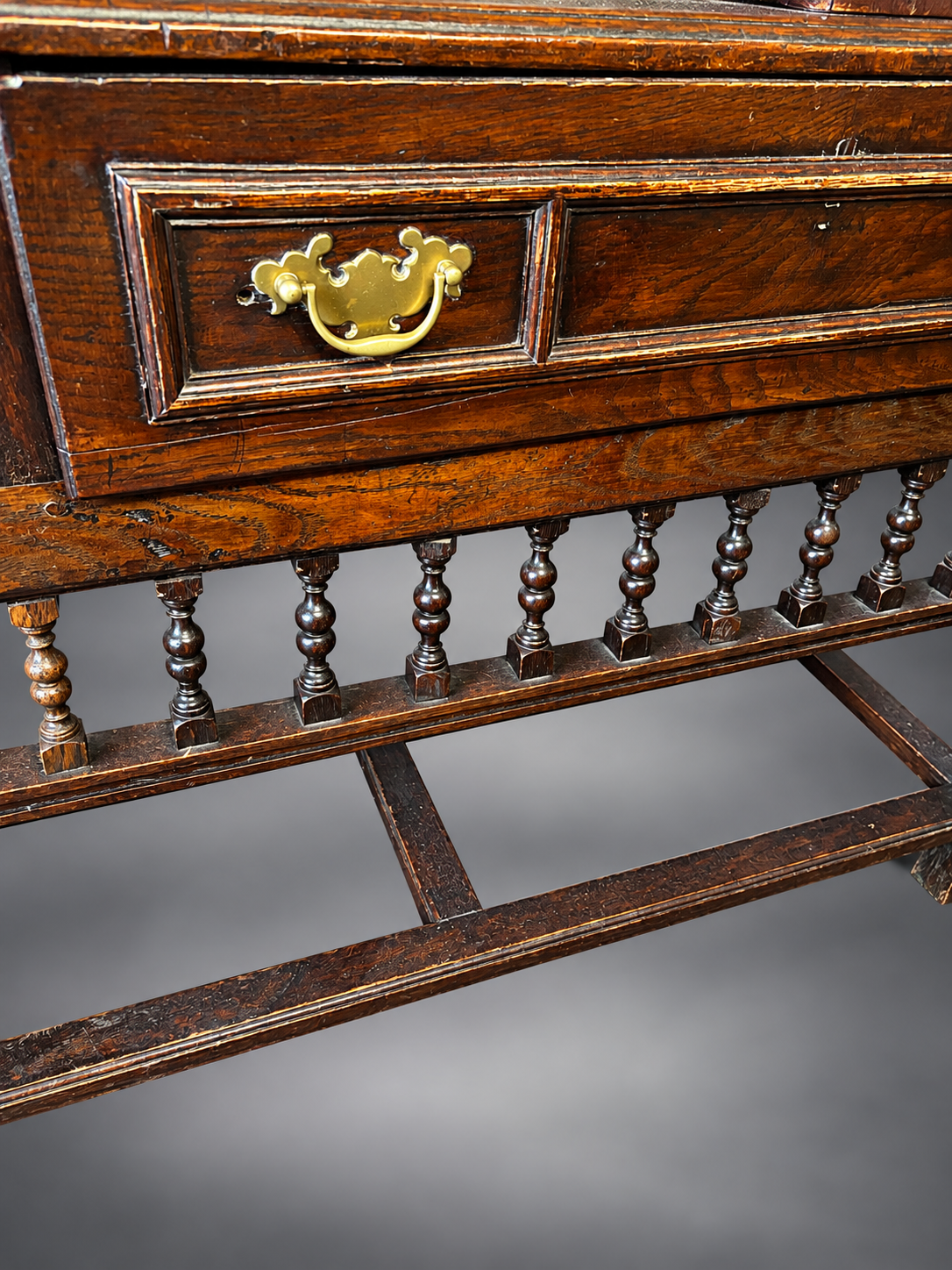 Antique Wood Cabinet with Brass Handle.png