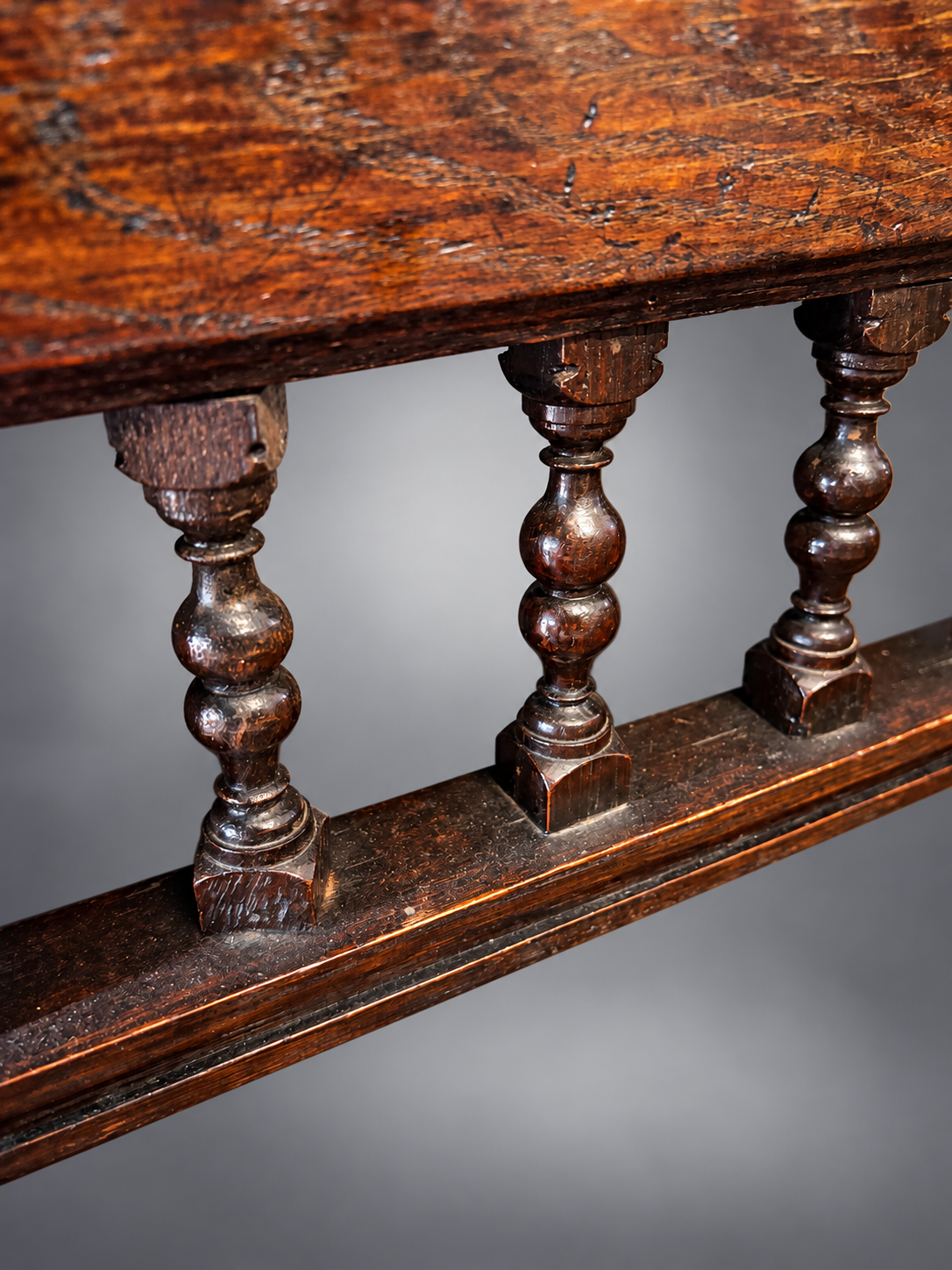 Antique Carved Oak Spindles Close-Up.png