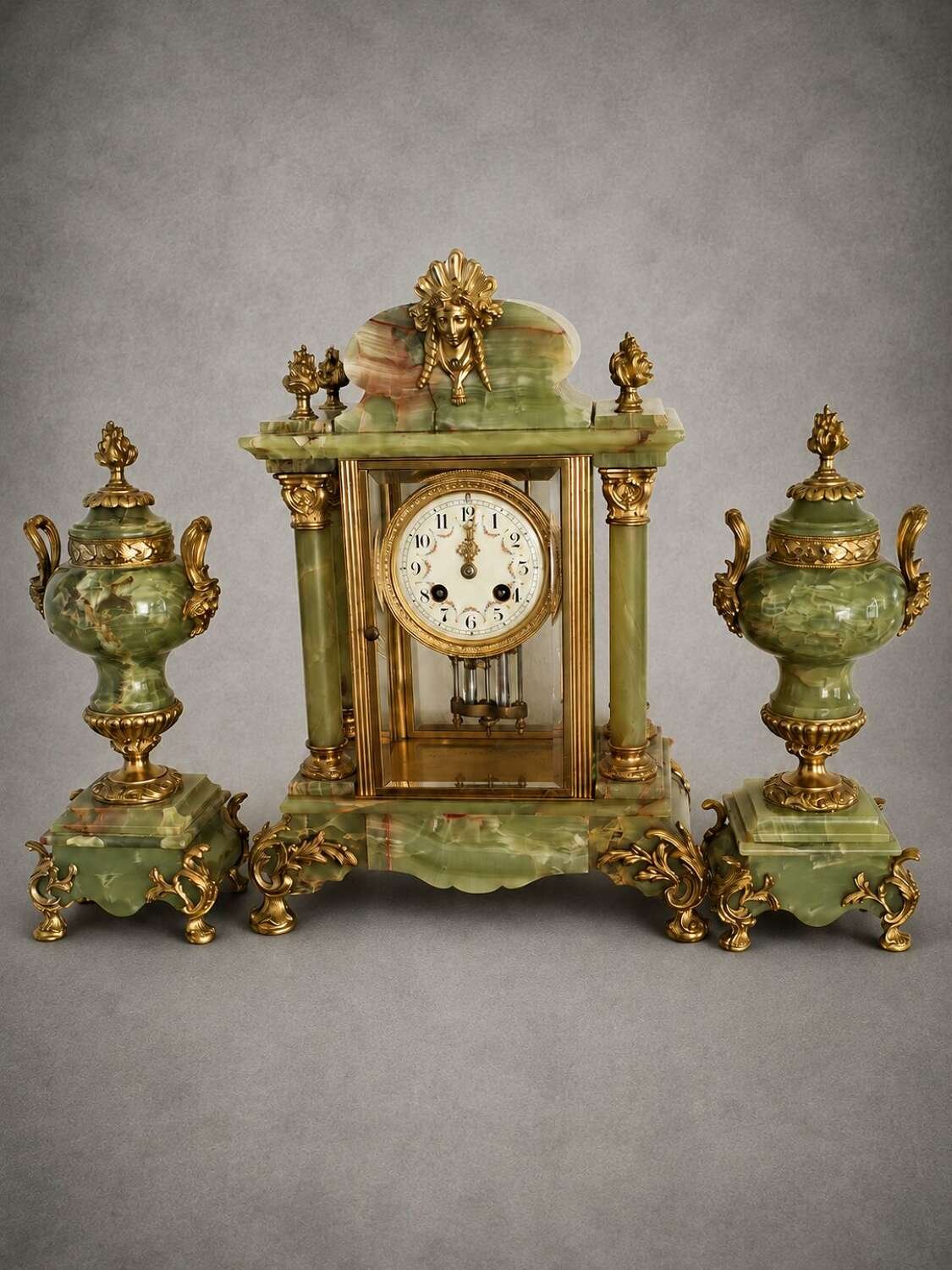 french-napoleon-iii-onyx-and-ormolu-portico-mantel-clock-garniture_10246_main_size3 (1).jpg