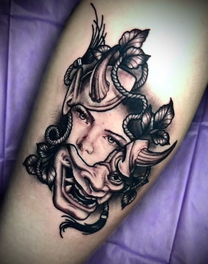 Detailed black and grey Tattoo.png