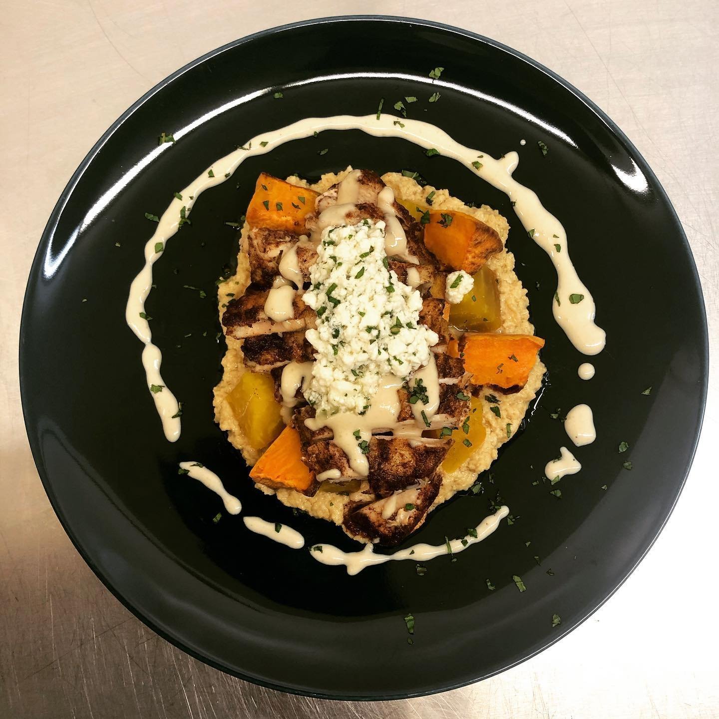 Soggy days call for warm, comforting meals, and our Mediterranean Chicken is just the ticket! Roast chicken supreme, hummus, sweet potato, roast beets, lemon-maple tahini &amp; feta-mint sauce. It has no direct contact with wheat/gluten, and it's fea