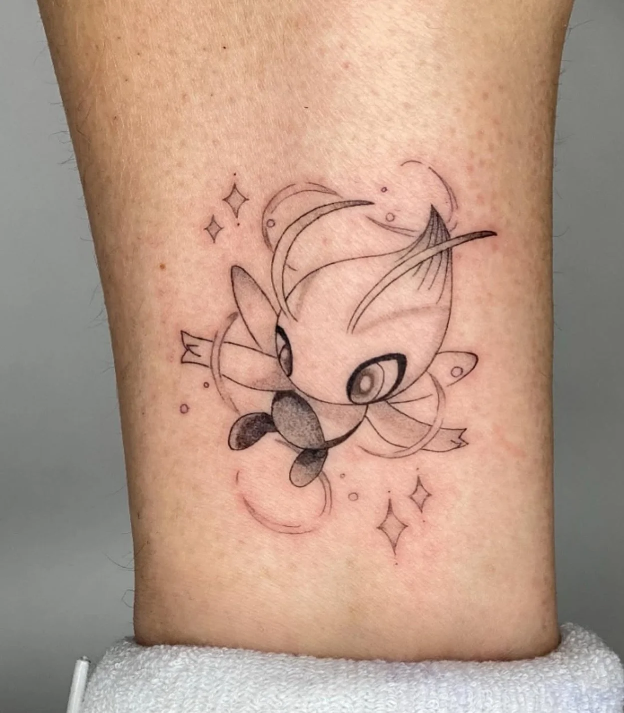 Celebi from Pok&eacute;mon 🧅 
Artist: @alcaterin.tattoo 
________________________________________________
[At Off the Ground Ink, we bring your tattoo ideas to life! 💭 For bookings and inquiries, reach out to us by email at offthegroundink@gmail]