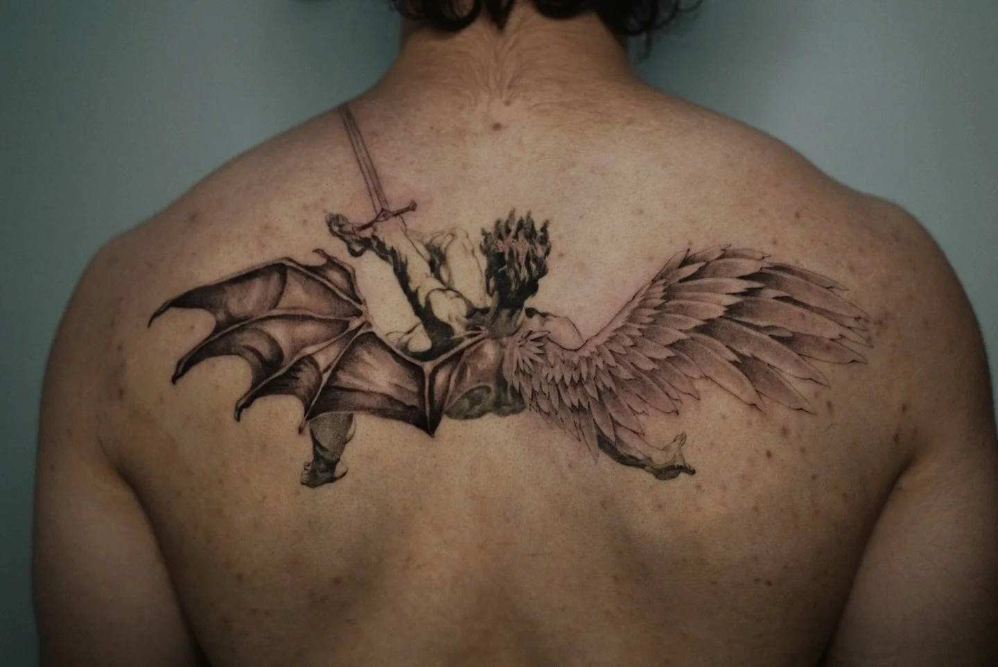 Fallen angel 🪽 
Artist: @yokaiink
________________________________________________
[At Off the Ground Ink, we bring your tattoo ideas to life! 💭 For bookings and inquiries, reach out to us by email at offthegroundink@gmail.com]