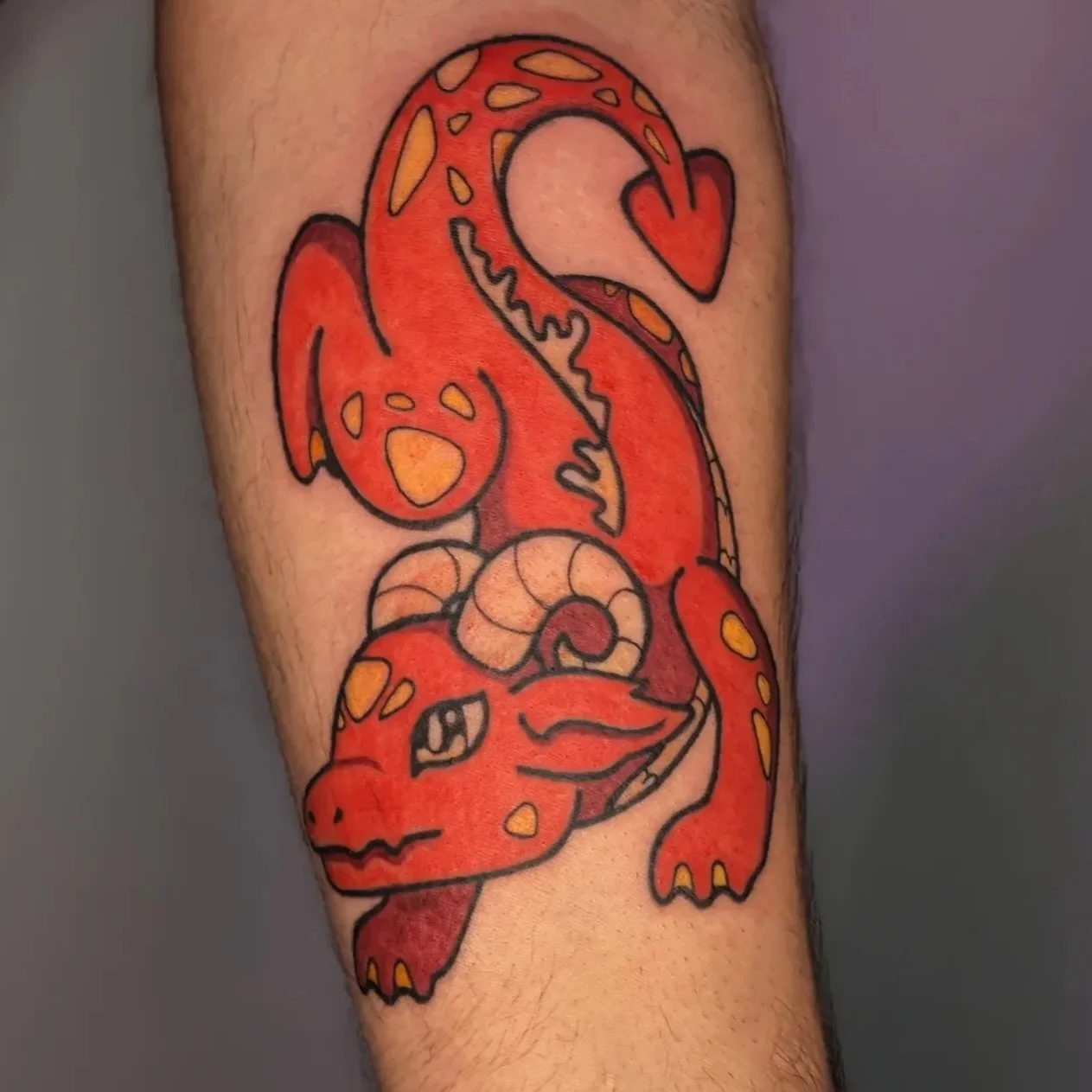 Custom color dragon 🐉 
Artist: @kaldrae.ink 
________________________________________________
[At Off the Ground Ink, we bring your tattoo ideas to life! 💭 For bookings and inquiries, reach out to us by email at offthegroundink@gmail.com]