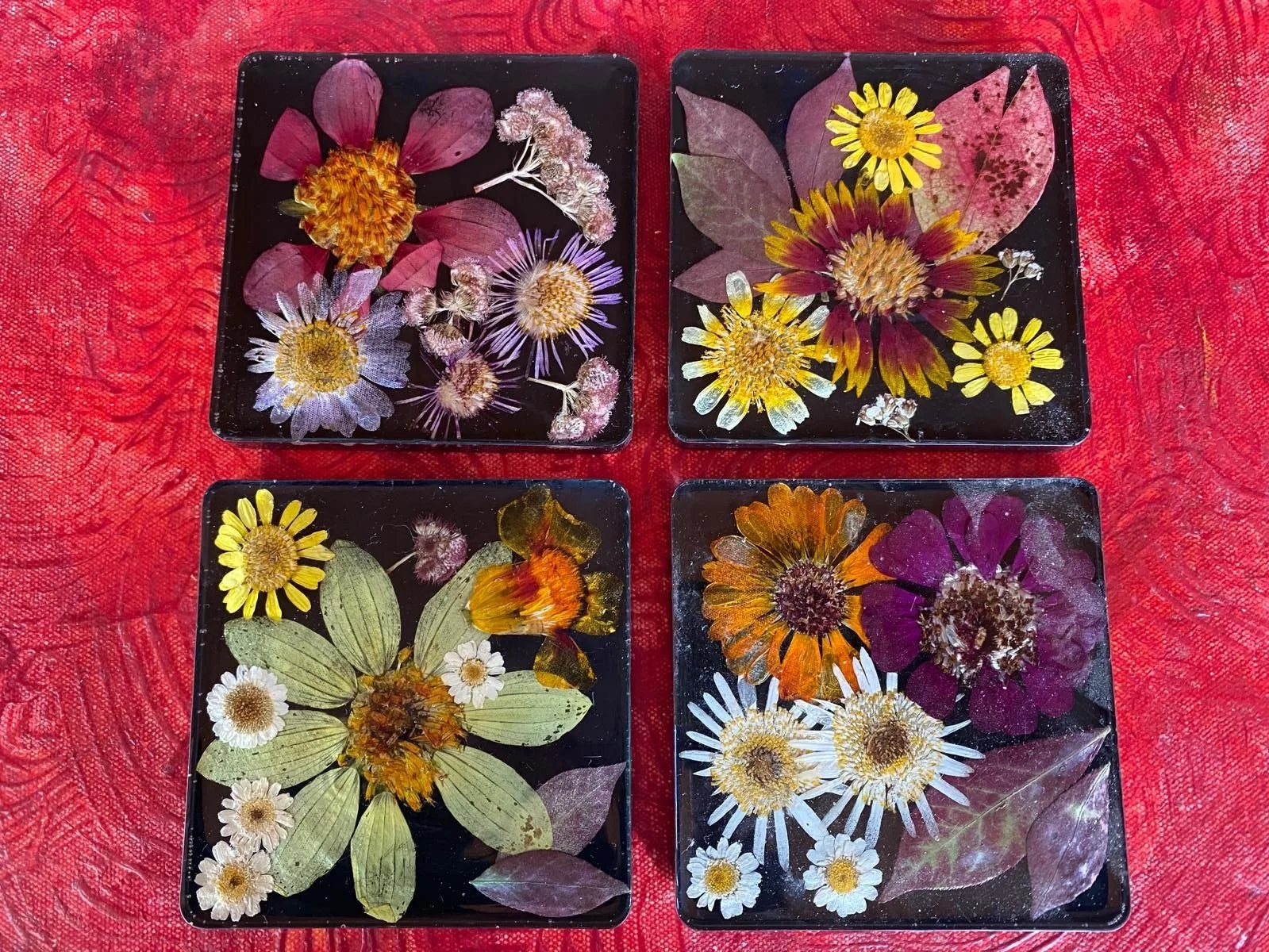 Coasters made with flowers from clients farm
