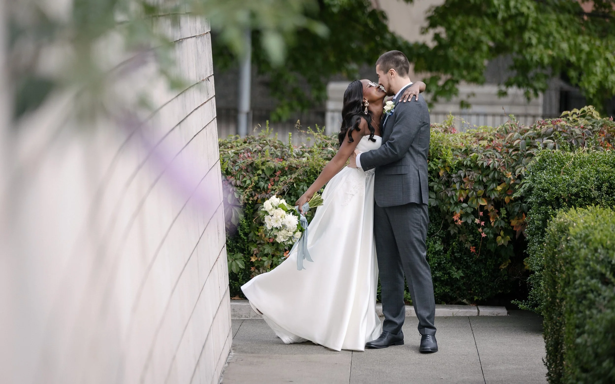  Ceci and Austin wedding couple sharing a quiet moment outside Seattle City Hall 