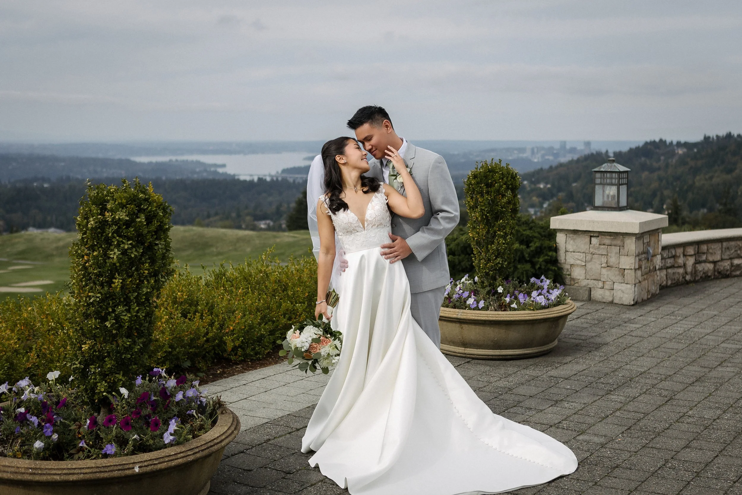 Bride and groom portrait at St. Andrews Ballroom at Newcastle Golf Club wedding venue with scenic overlook in Newcastle WA