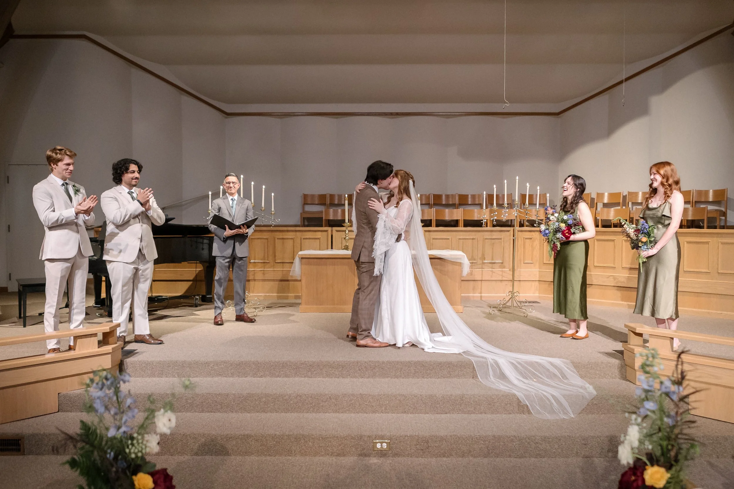 First kiss at Lake Forest Park Presbyterian Church wedding