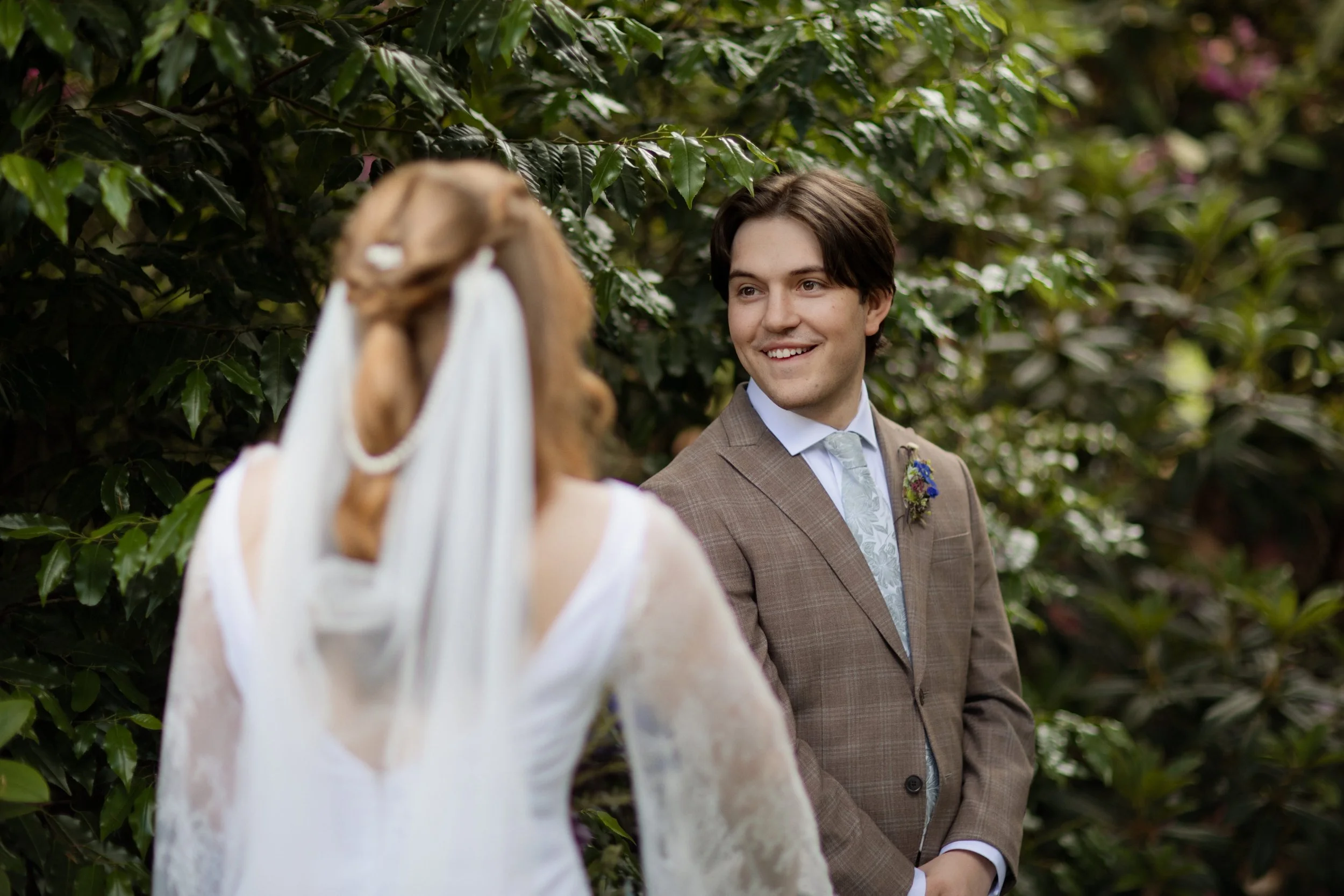 bride and groom first look moment