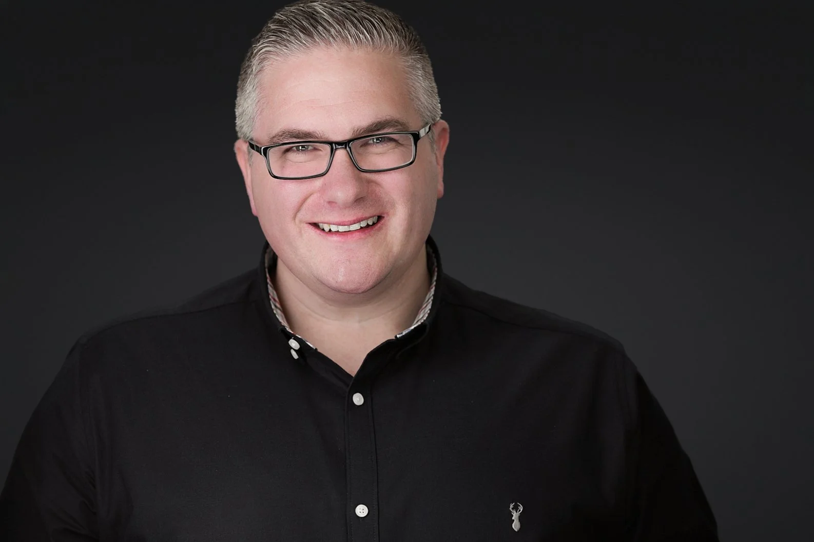 Professional headshot for company website and LinkedIn