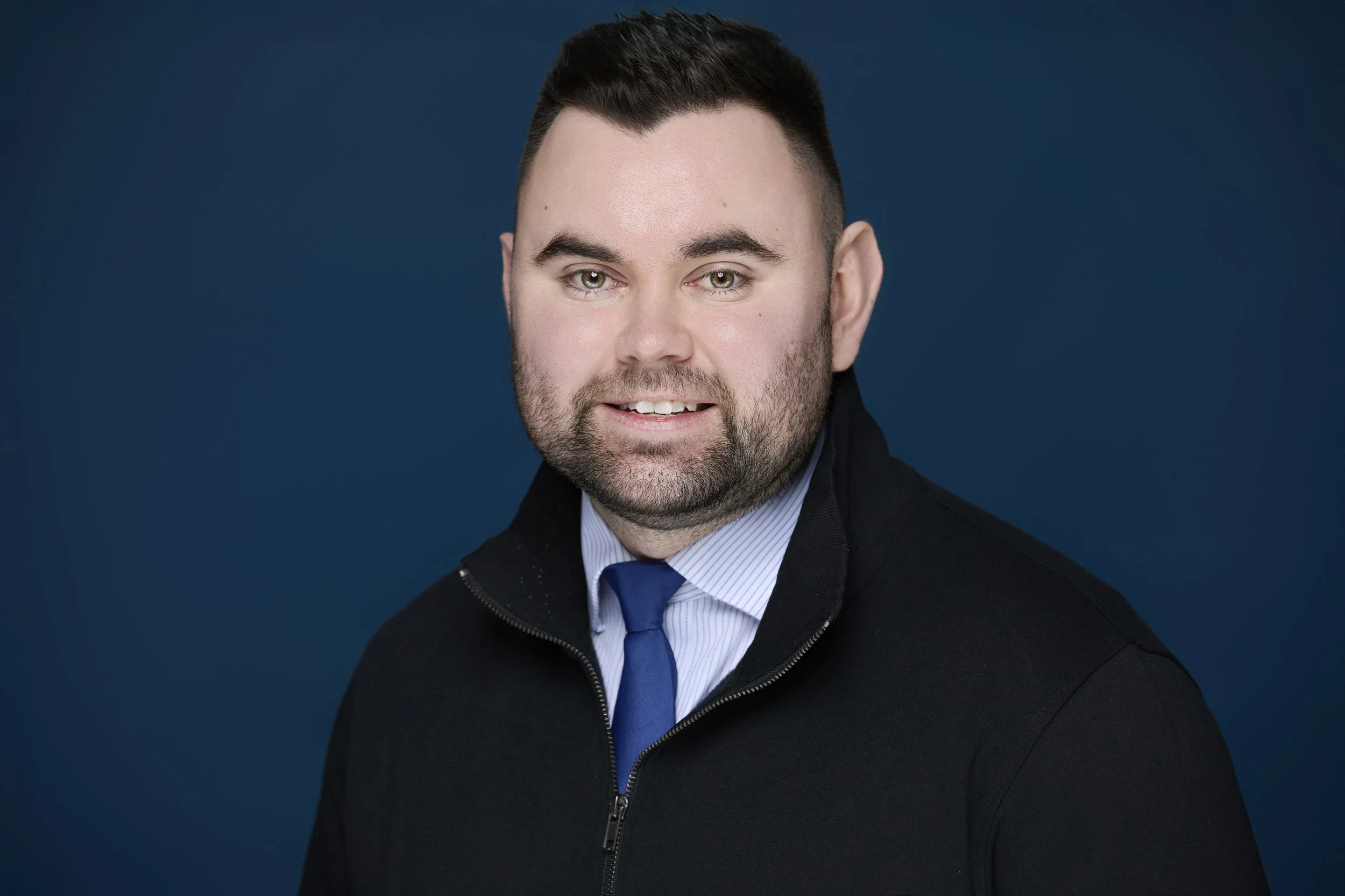 Studio headshot for corporate and LinkedIn use