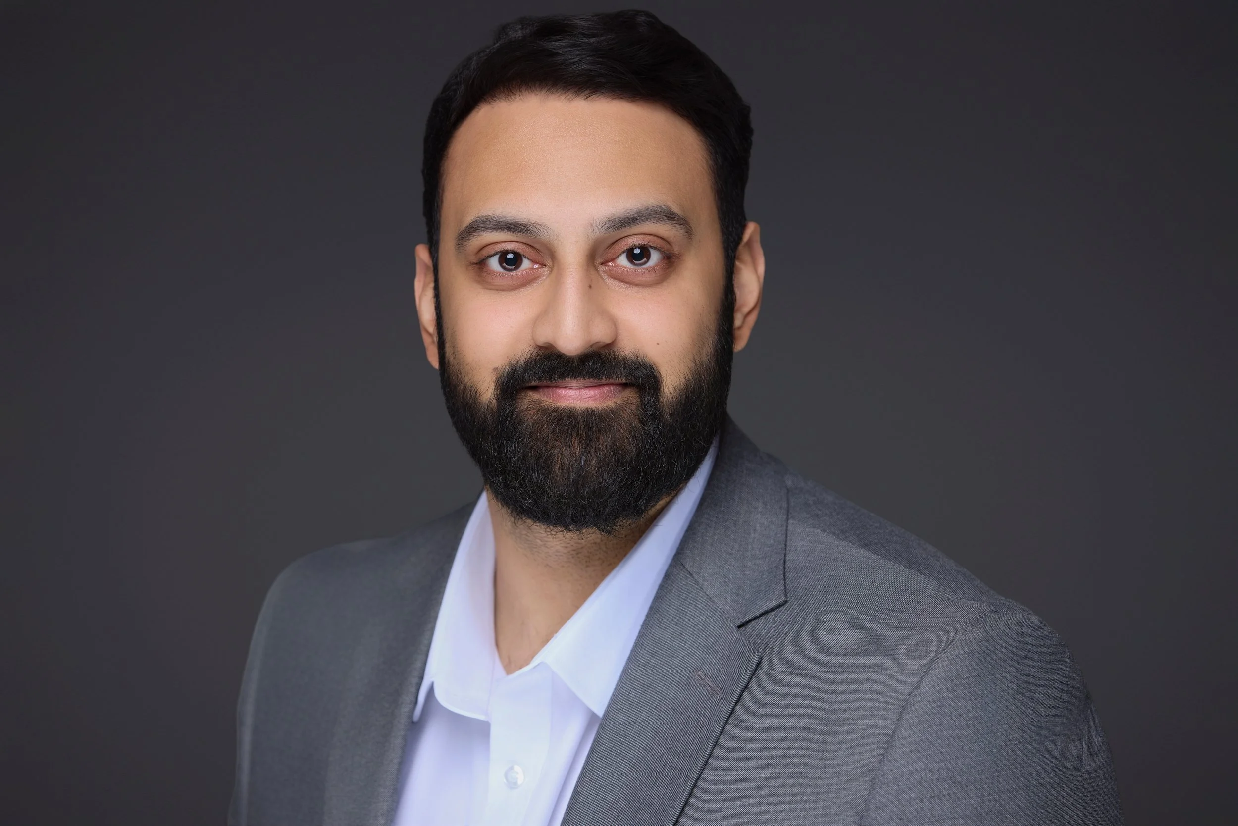 Professional studio headshot for LinkedIn profile