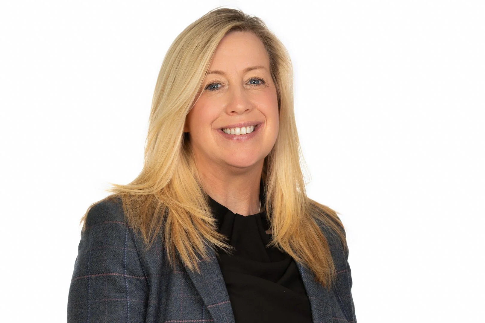 Business headshot of professional with classic white background