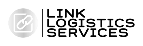 A black silhouette of a cat sitting on a desk with a laptop, mug, and notebook in front of it.