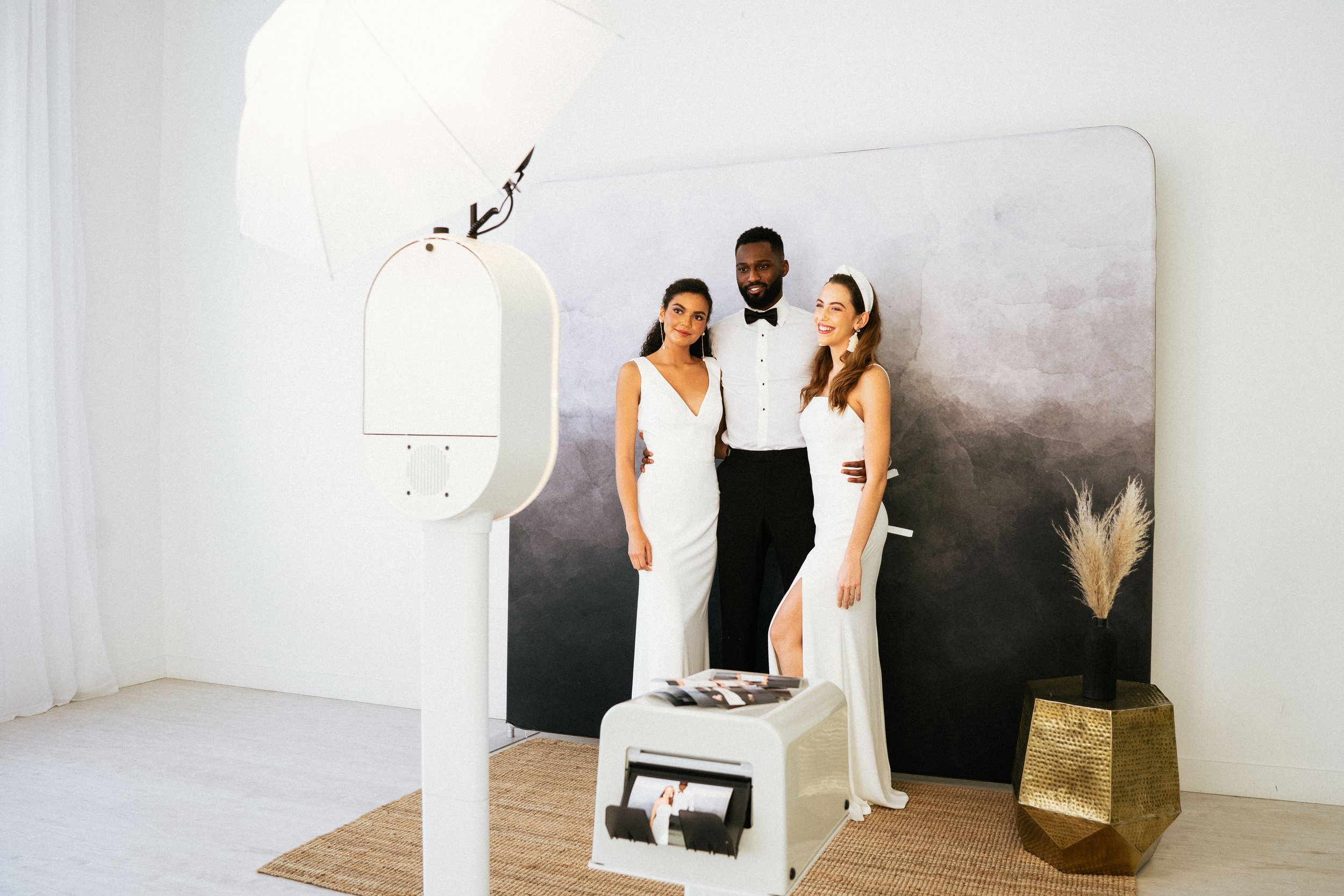 Wedding guests taking photo booth pictures Michigan