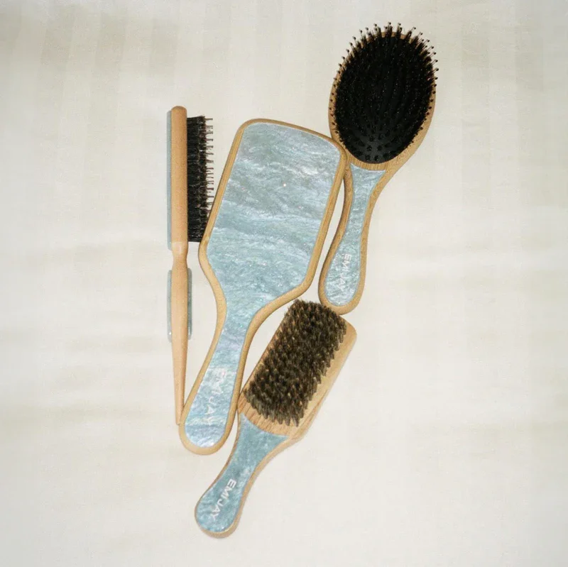 Eco-friendly Emi Jay paddle brush with bamboo handle and wooden bristles