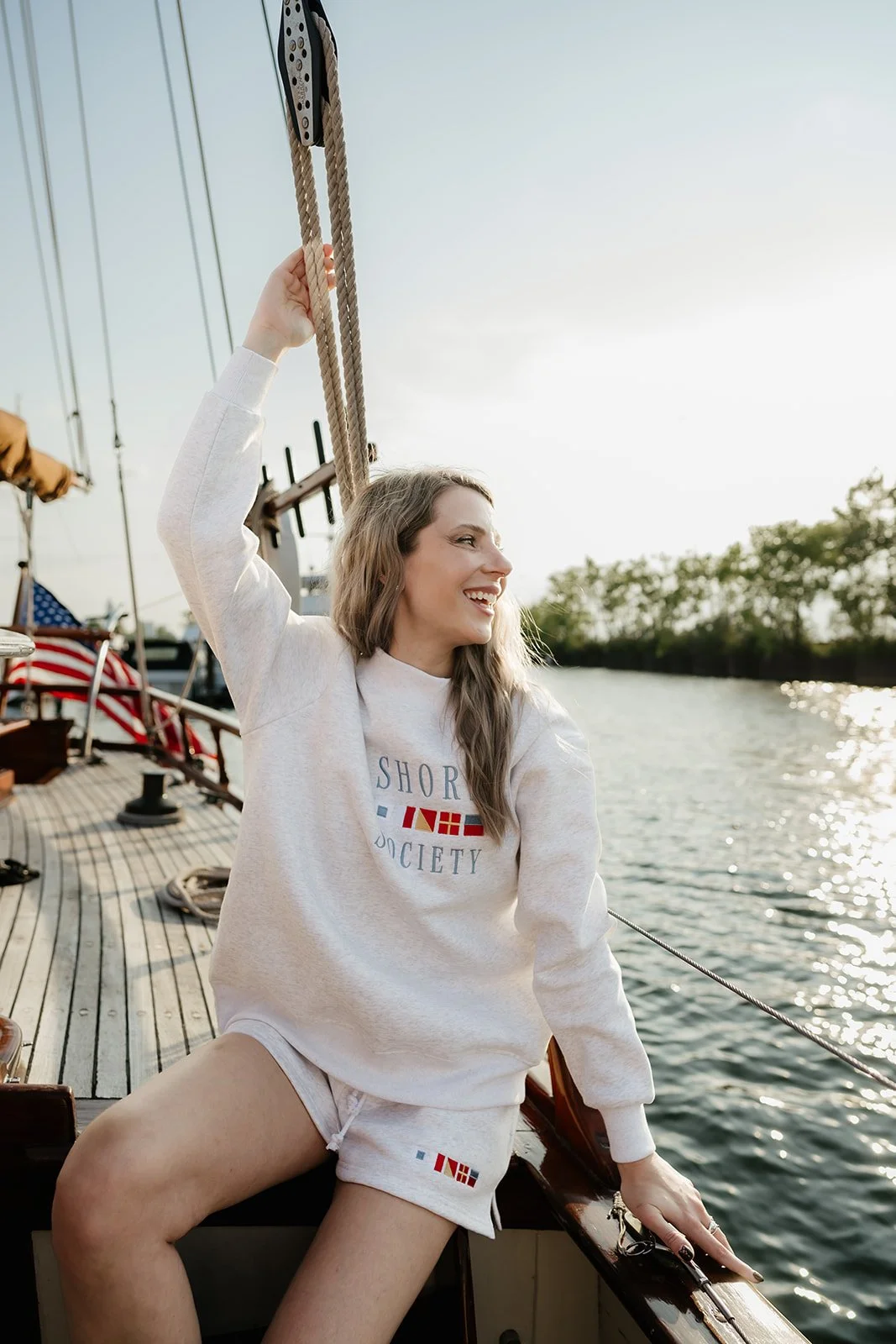 Heather gray Shore Society mockneck sweatshirt with colorful nautical signal flags, a classic preppy coastal sweatshirt