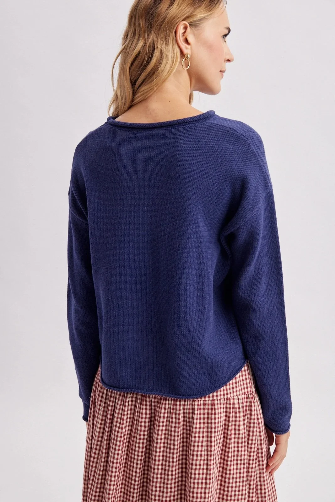 Navy lighthouse sweater with white coastal lighthouse design, a nautical knit for fall.