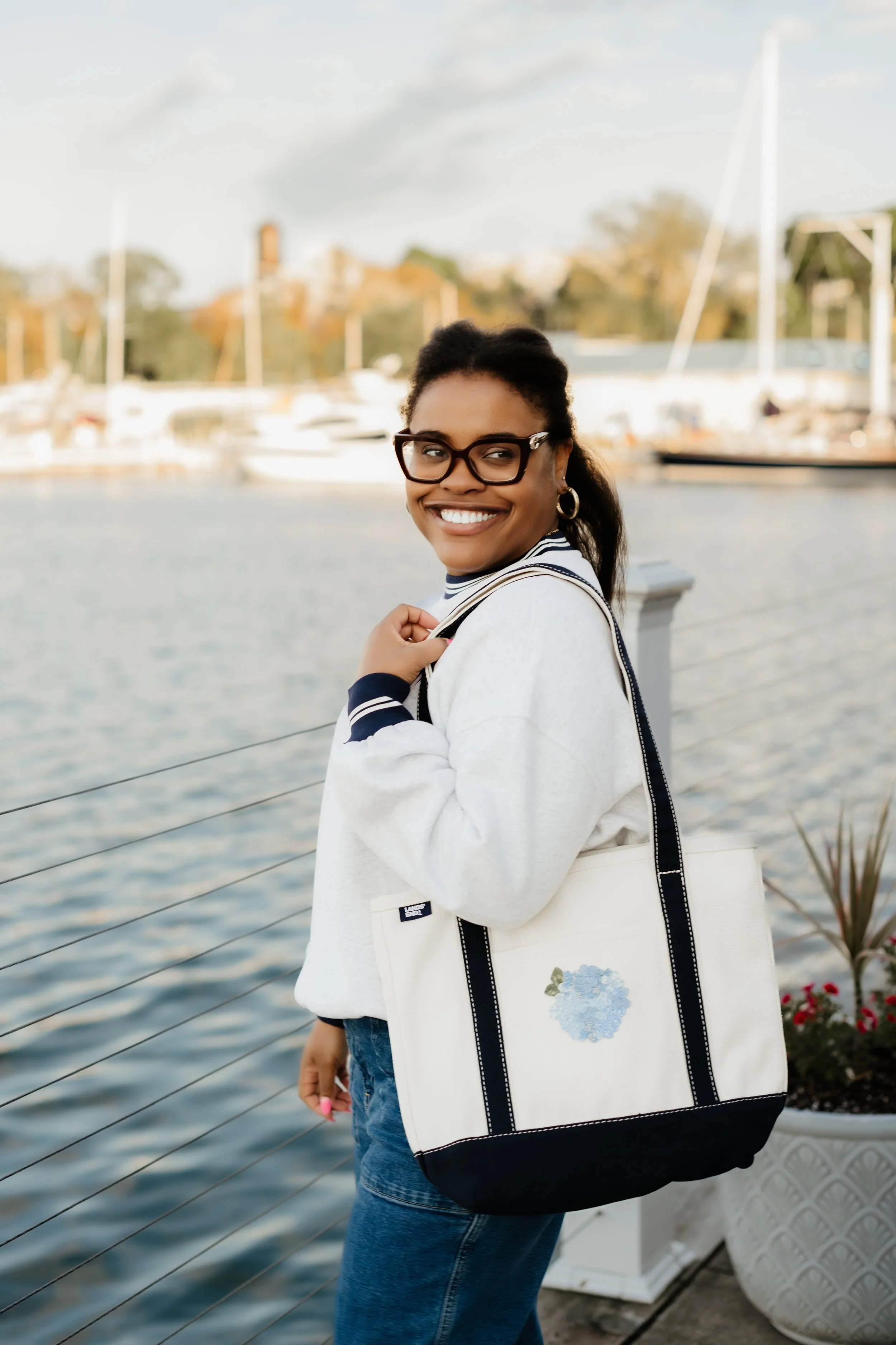 Vacation-inspired clothing, totes, home goods, and jewelry for stylish women who love the water