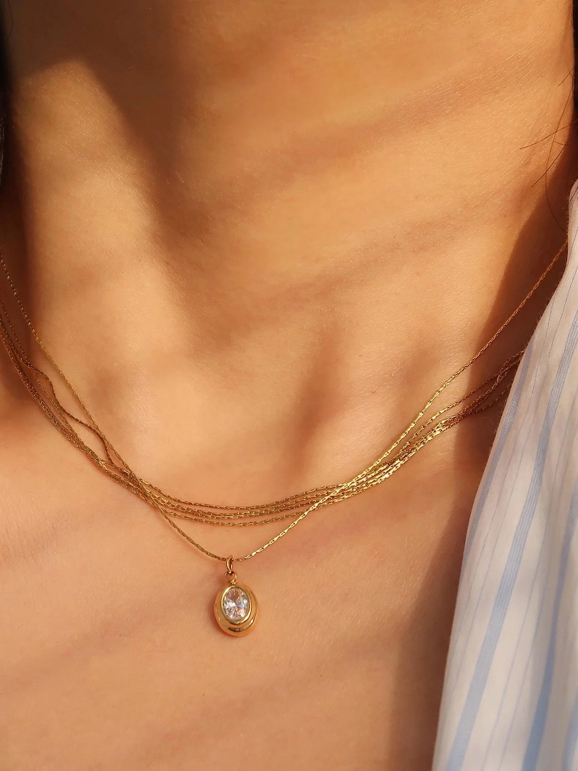 Cornelia gemstone necklace with oval clear stone