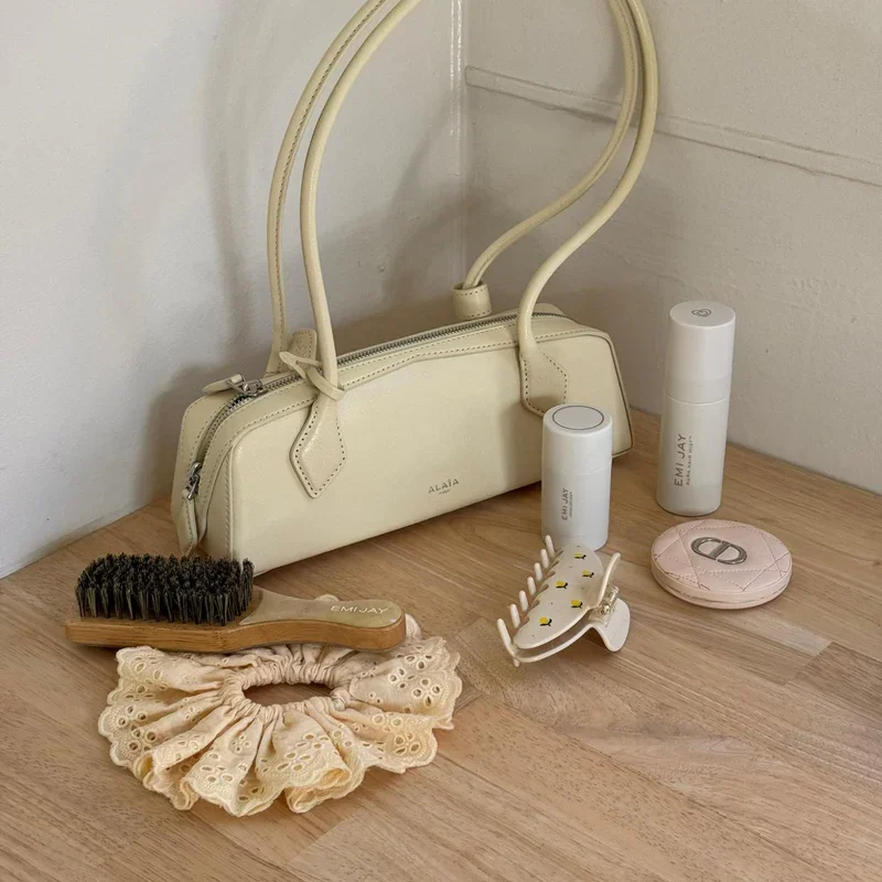 Emi Jay mini boar bristle hair brush with lemon yellow marbled handle