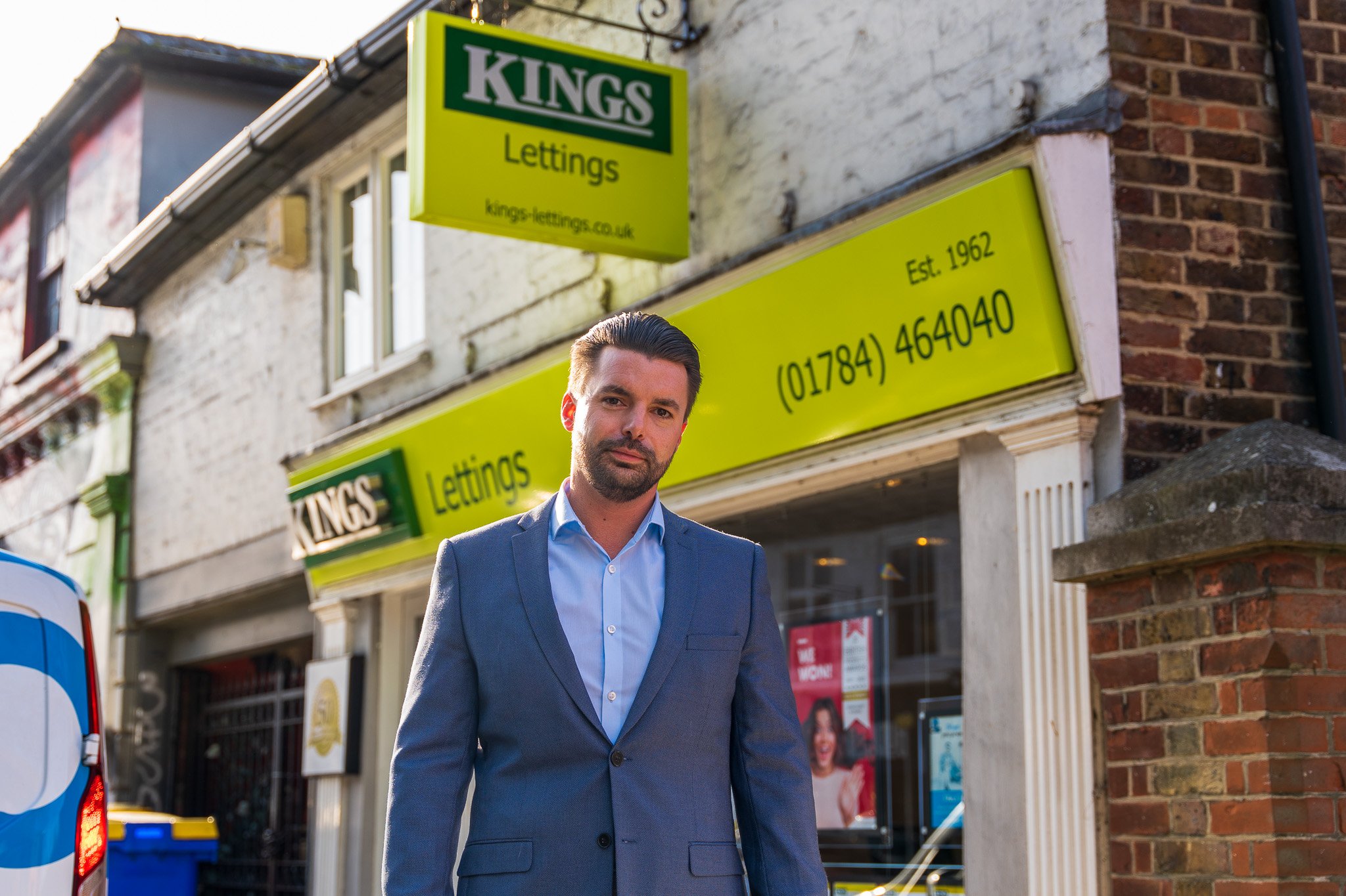 Oliver King standing outside Kings Lettings branch in Staines