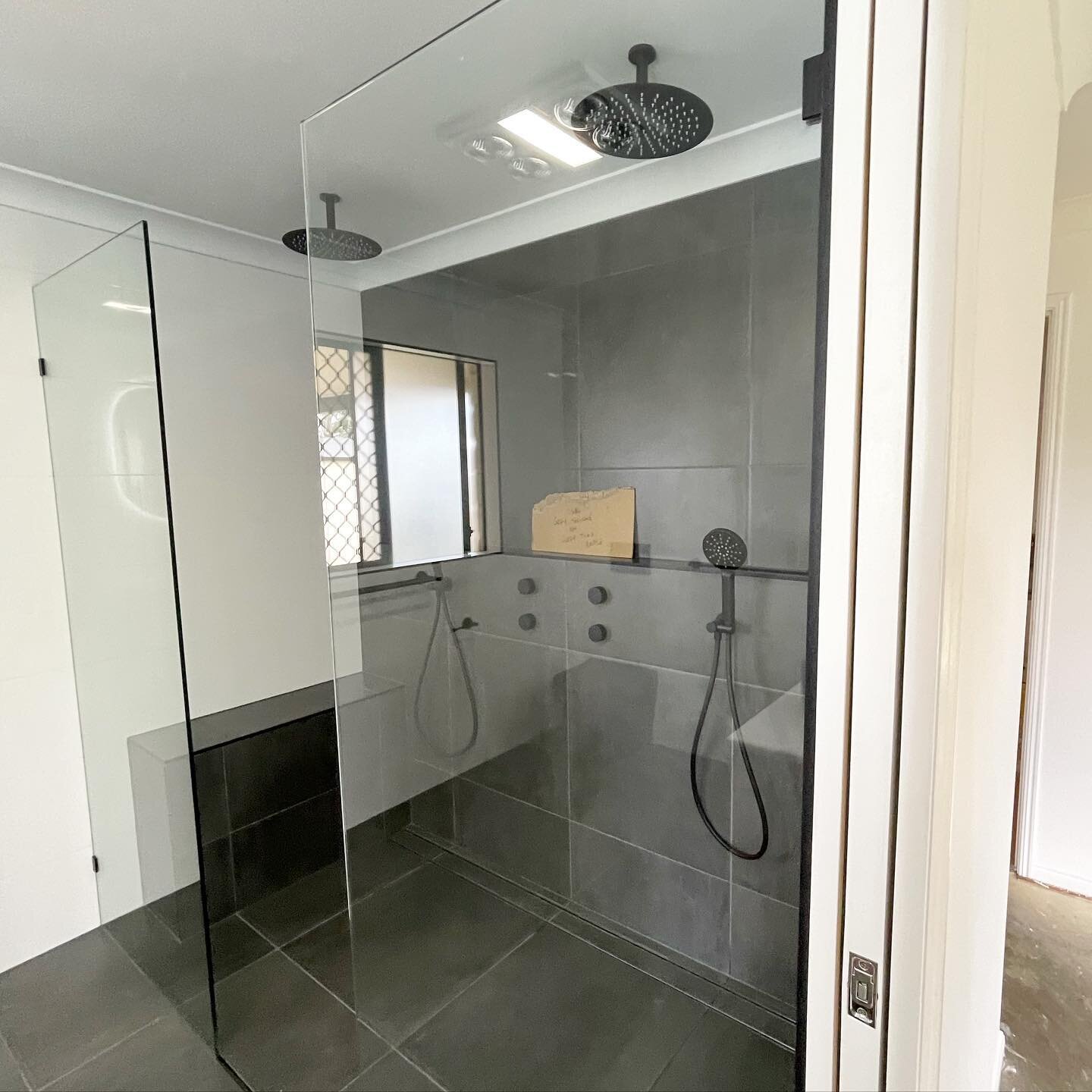 Check out this stunning walk-in shower by Gold Star Bathrooms! 😍😍 

We recently installed double shower heads on each side, creating a luxurious and functional space that is perfect for couples or families.

The shower features sleek and modern mat