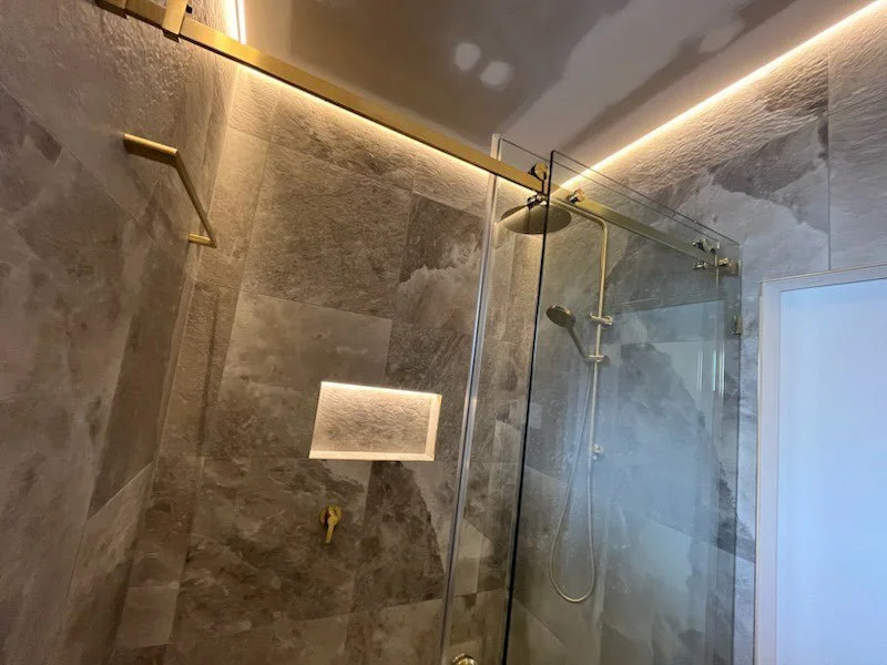 Bathroom renovation Brisbane - led light in ceiling - brushed brass finish