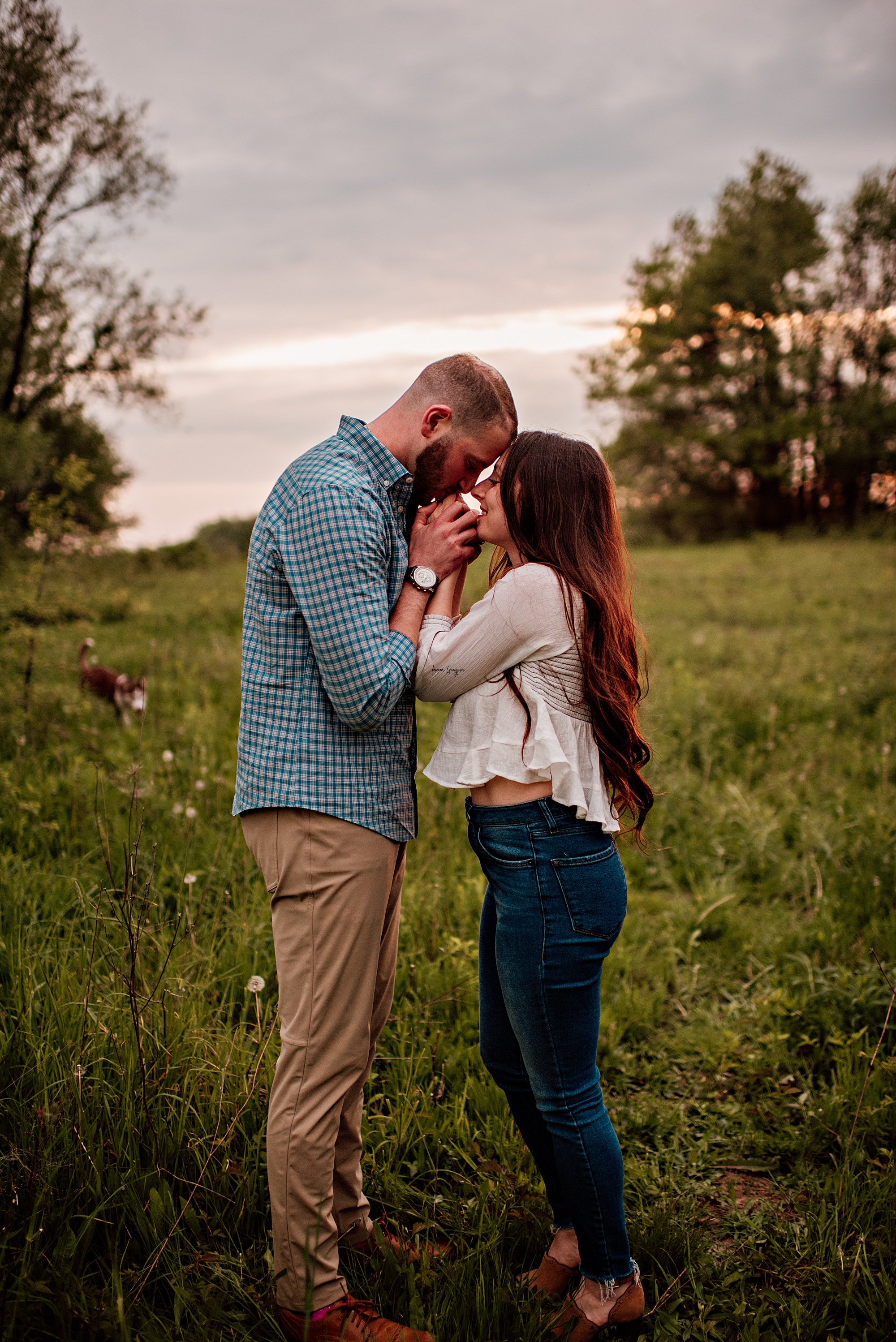 lauren-grayson-photography-akron-cleveland-ohio-couples-puppy-dog-photo-session-engagement-fields-sunet_0026.jpeg