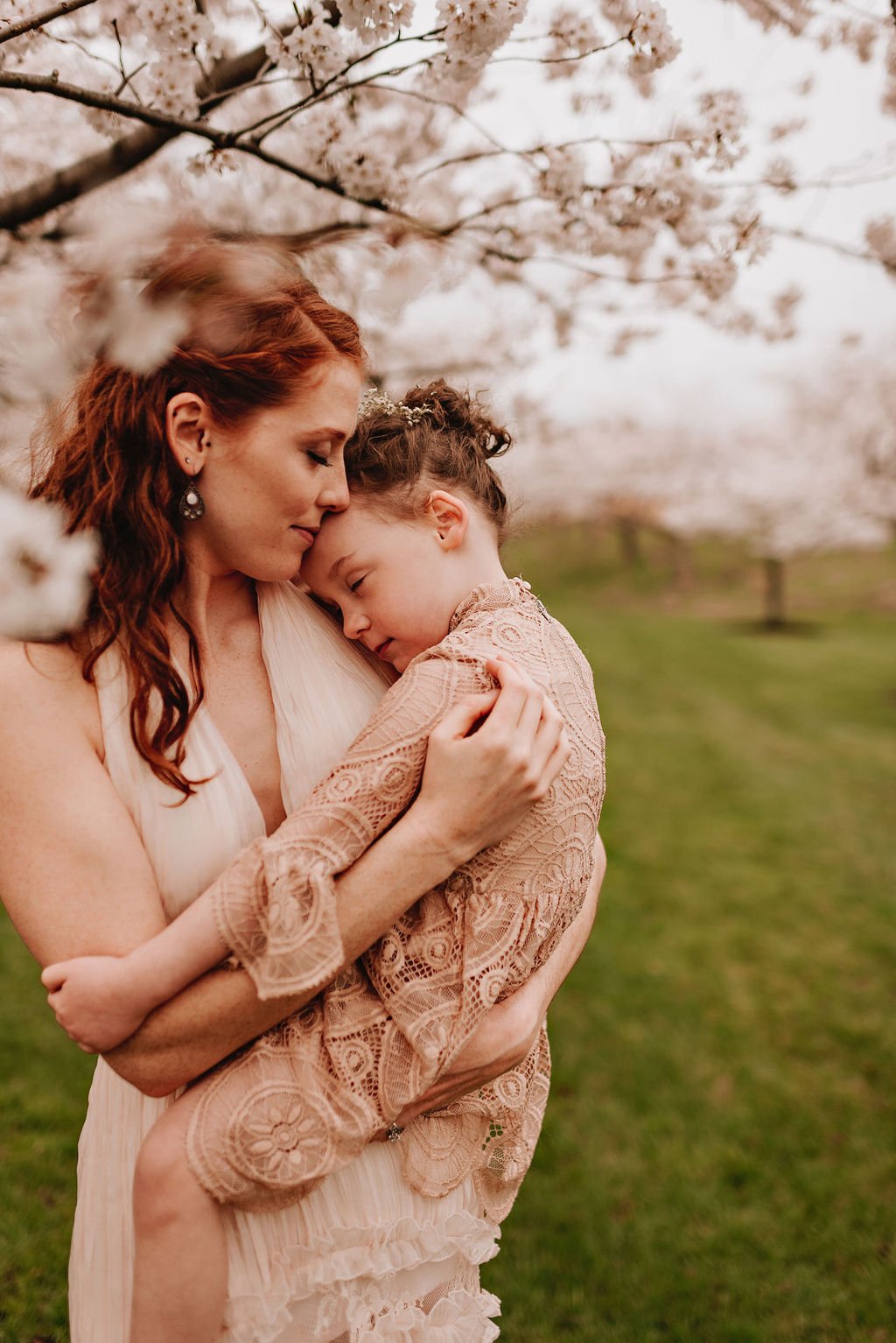 cleveland-ohio-family-mother-daughter-son-outdoor-spring-session-flower-cherry-blossoms20.jpg
