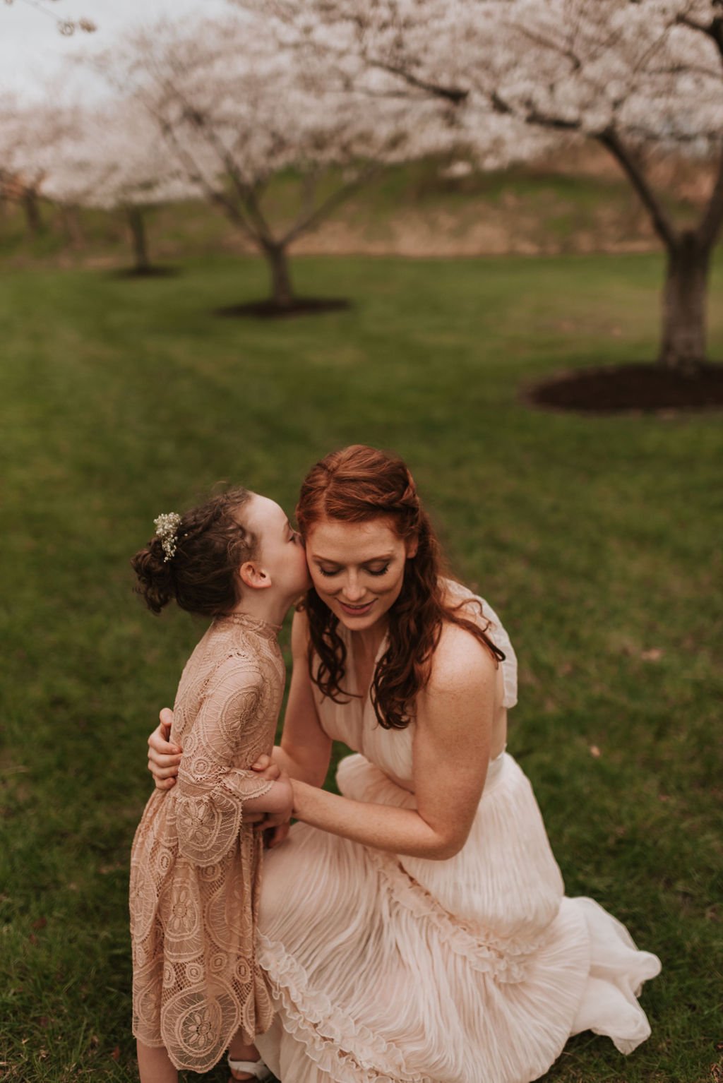 cleveland-ohio-family-mother-daughter-son-outdoor-spring-session-flower-cherry-blossoms16.jpg