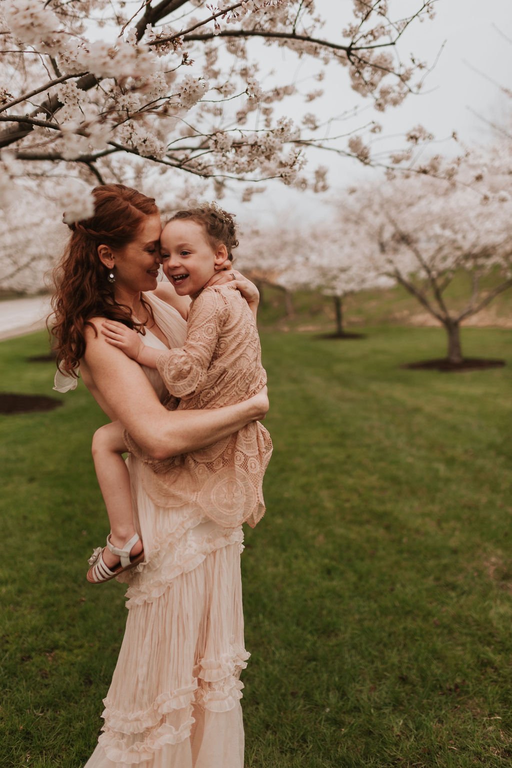 cleveland-ohio-family-mother-daughter-son-outdoor-spring-session-flower-cherry-blossoms26.jpg