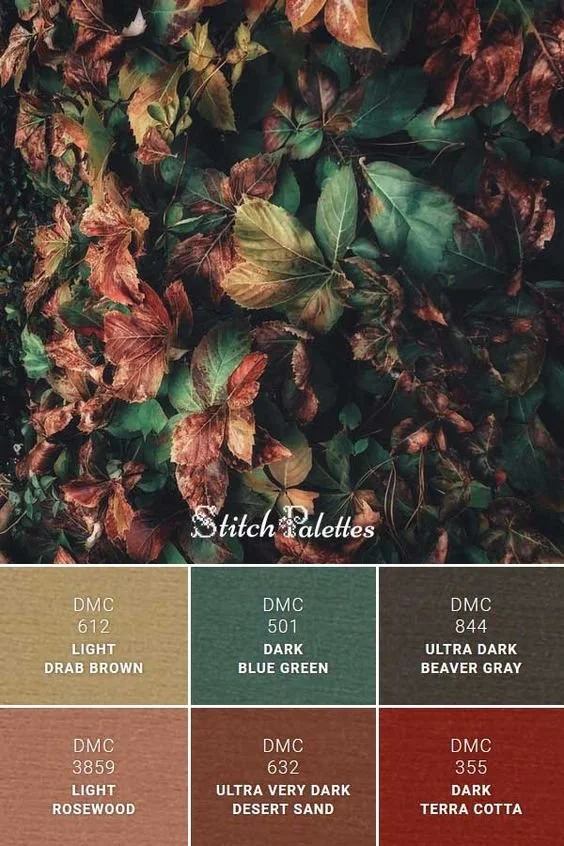 Autumn leaves in various colors with six matching DMC thread colors: Light Drab Brown, Dark Blue Green, Ultra Dark Beaver Gray, Light Rosewood, Ultra Very Dark Desert Sand, and Dark Terra Cotta.