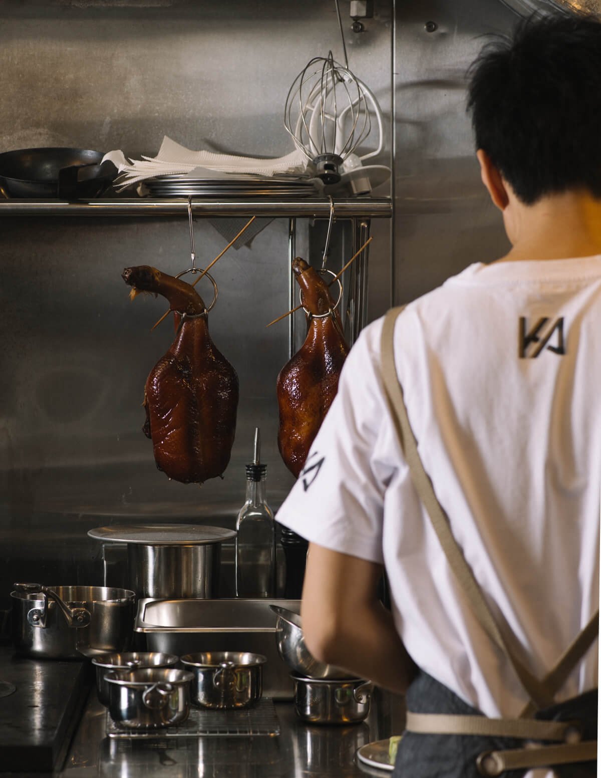  Chef preparing food in an industrial kitchen 
