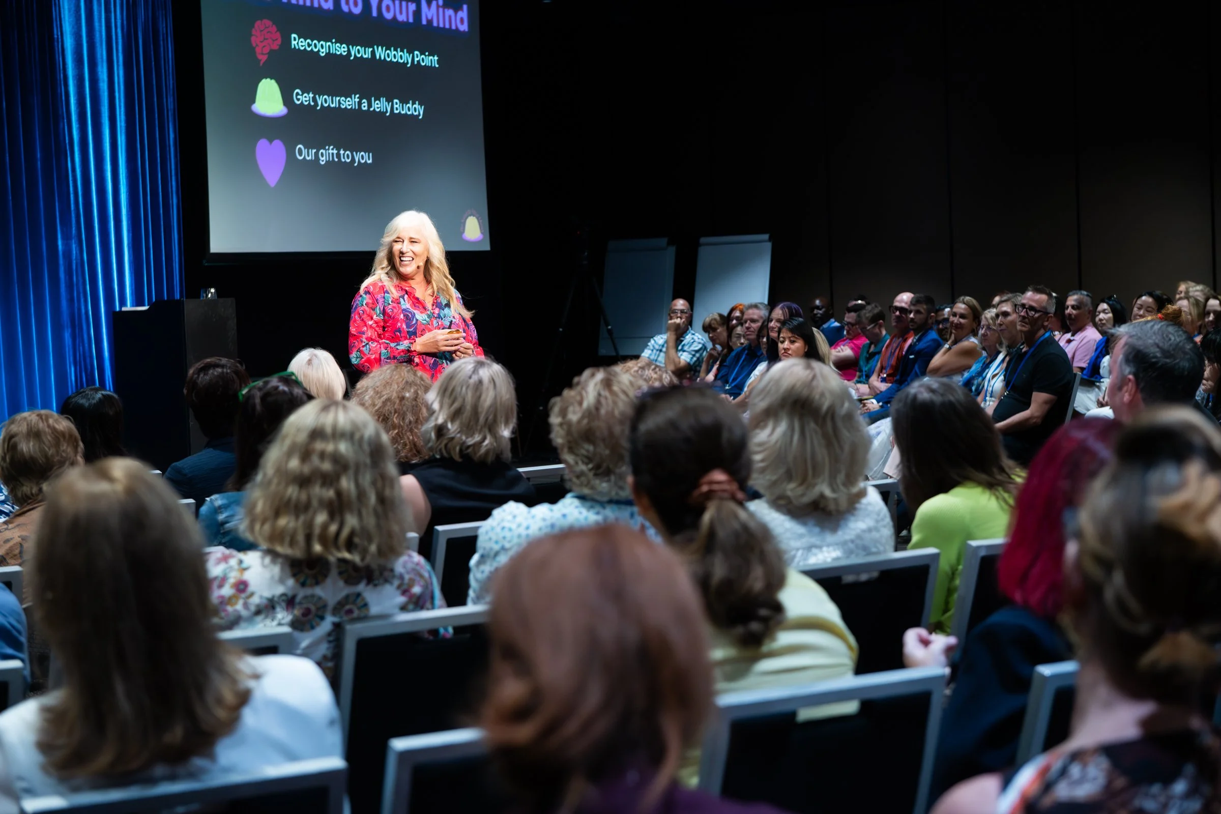 Julia Grace presenting at a conference