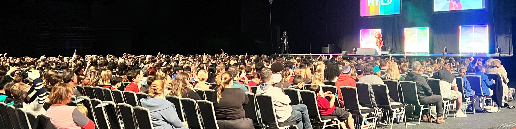 Julia Grace keynote speaker presenting to a conference audience