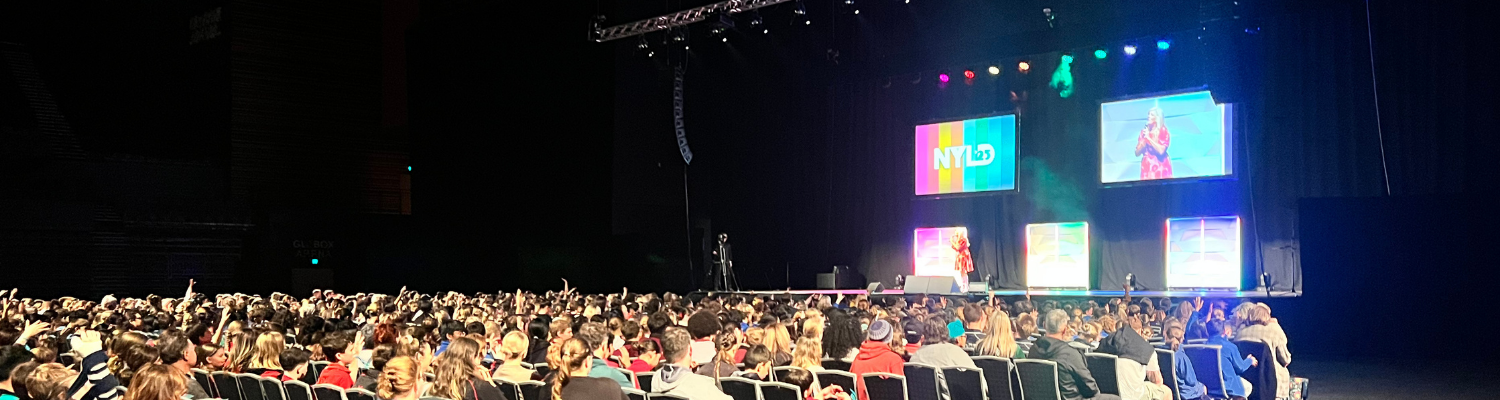 Julia Grace keynote speaker presenting to a conference audience