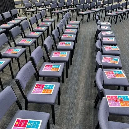 Julia Grace event resources laid out on seats
