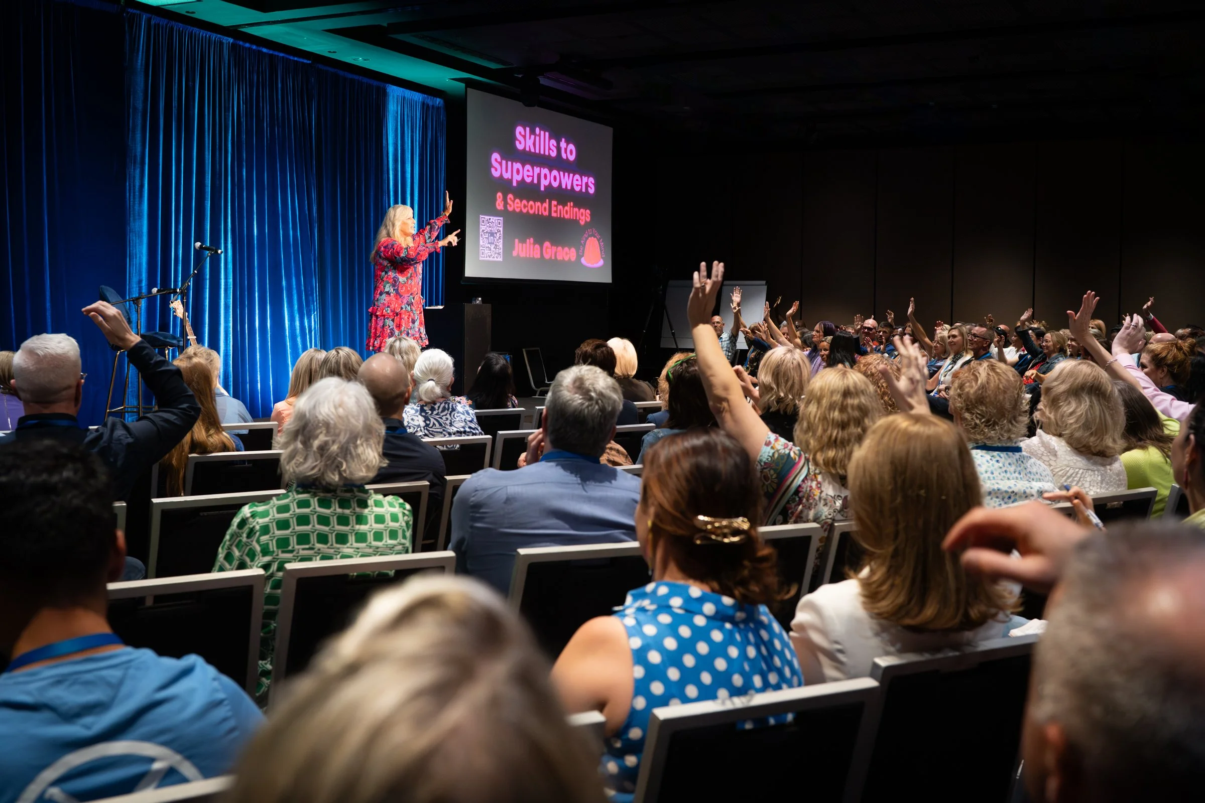 Engaged audience at a Julia Grace event
