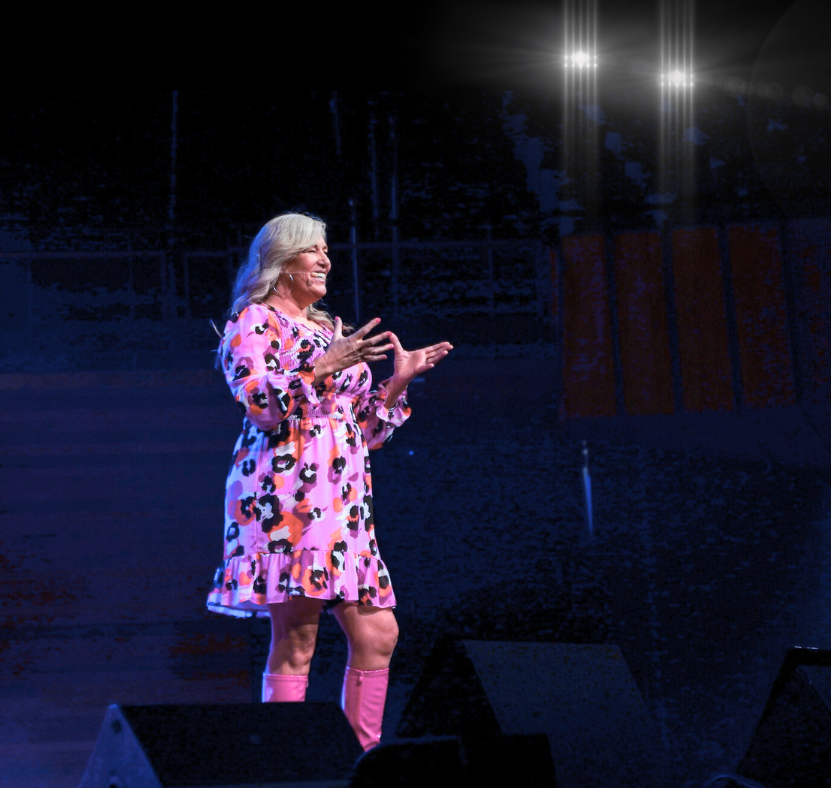 Julia Grace delivering a keynote presentation at a conference