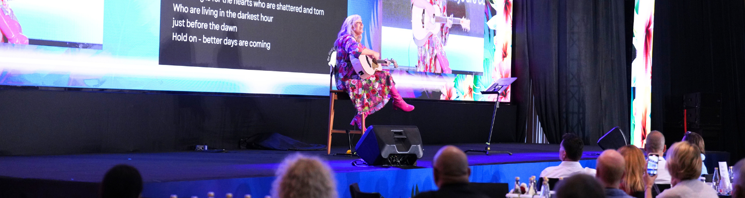 Julia Grace performing on stage