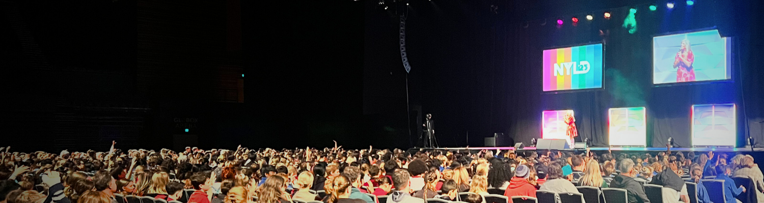 Julia Grace with a large audience