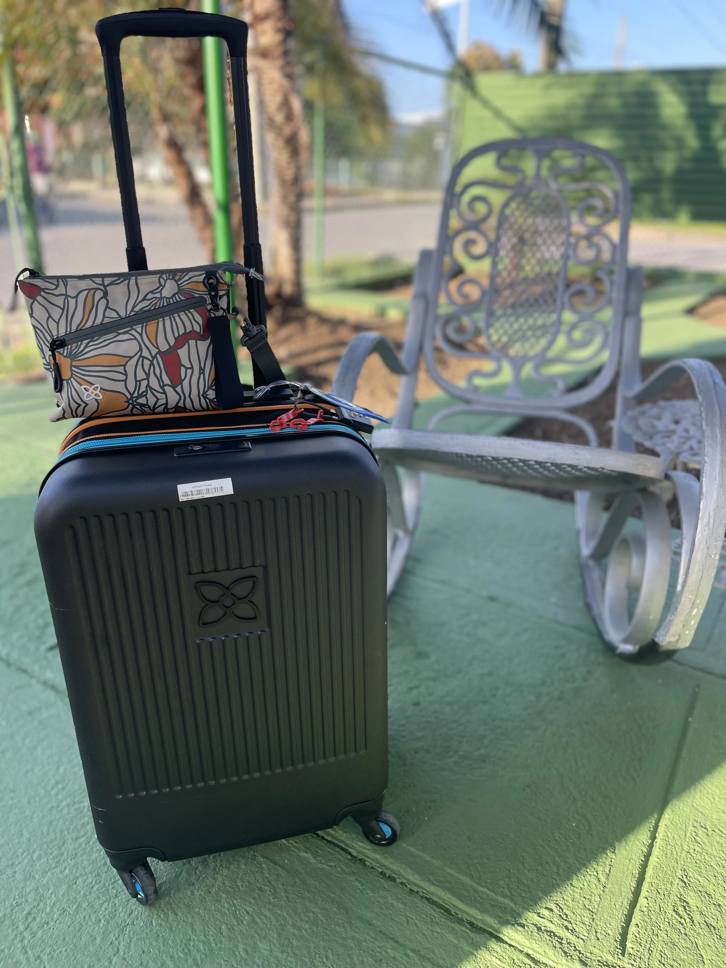Suitcase and rocking chair