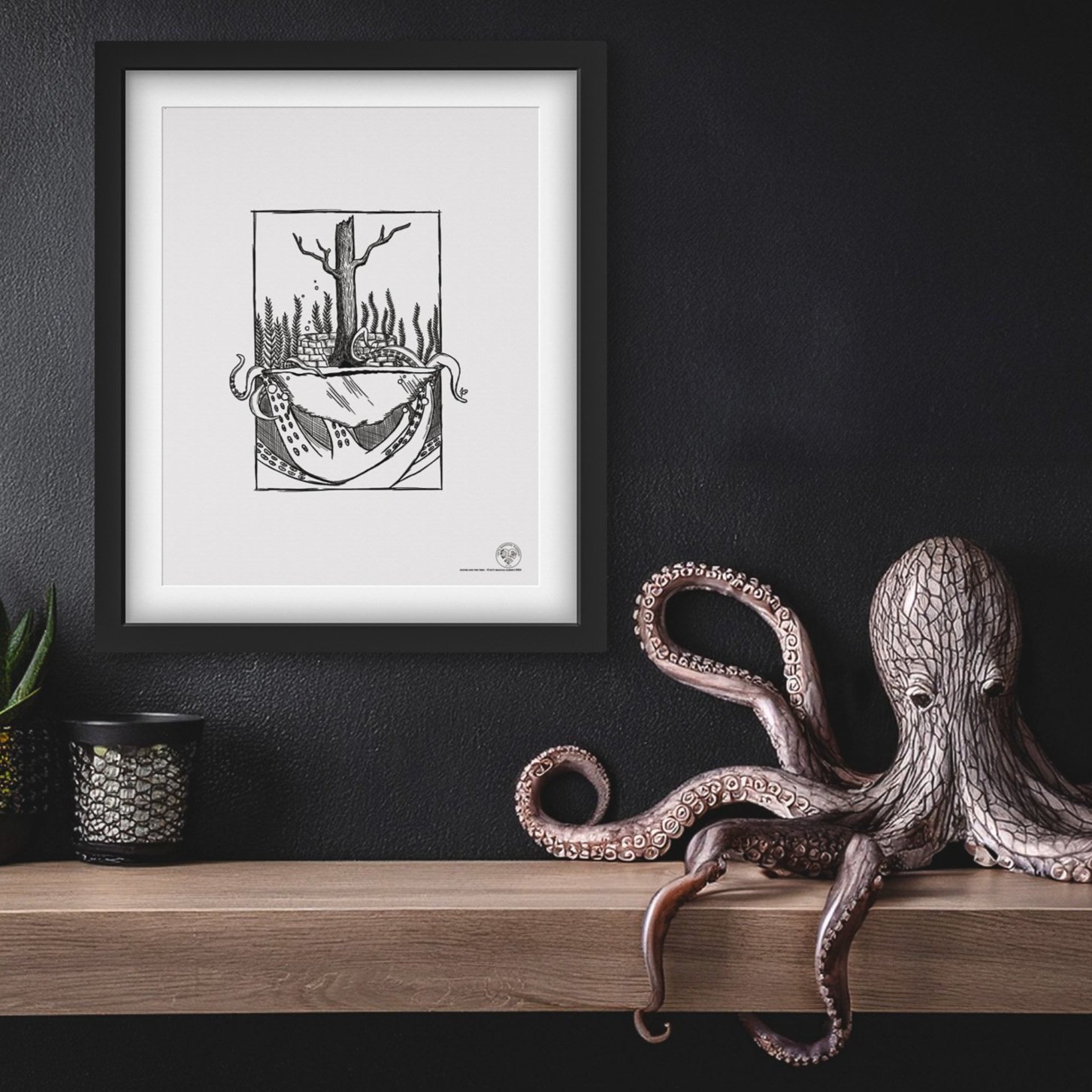 mockup of print in black frame on black wall, shelf with octopus sculpture below.