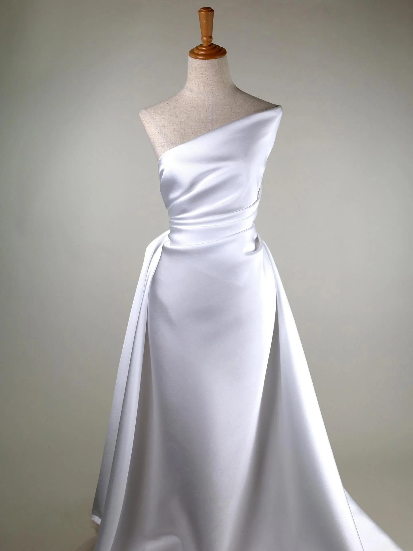 By popular demand, our most popular bridal fabric now available in light ivory.

Polyester mikado 220 gsm. Perfect drape, handle and lustre for modern bridal silhouettes. 150cm wide. Available from stock. Used by the world&rsquo;s most influential br