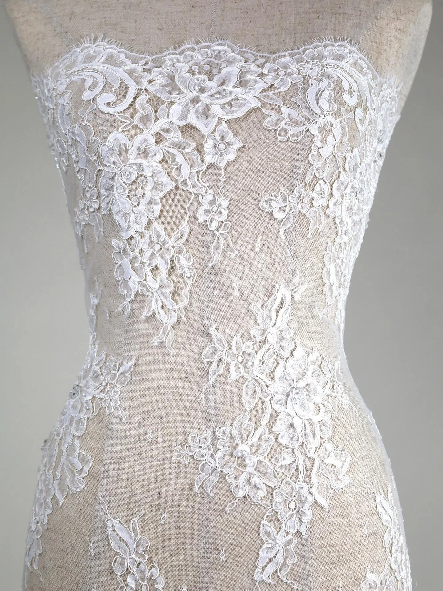 New Product
F7066CB &middot; Corded &amp; Beaded Lace &middot; Ivory &middot; 142cm Width

A refined lace with corded embroidery and delicate beadwork, finished with an eyelash edge for timeless bridal detailing. Its soft drape and subtle embellishme