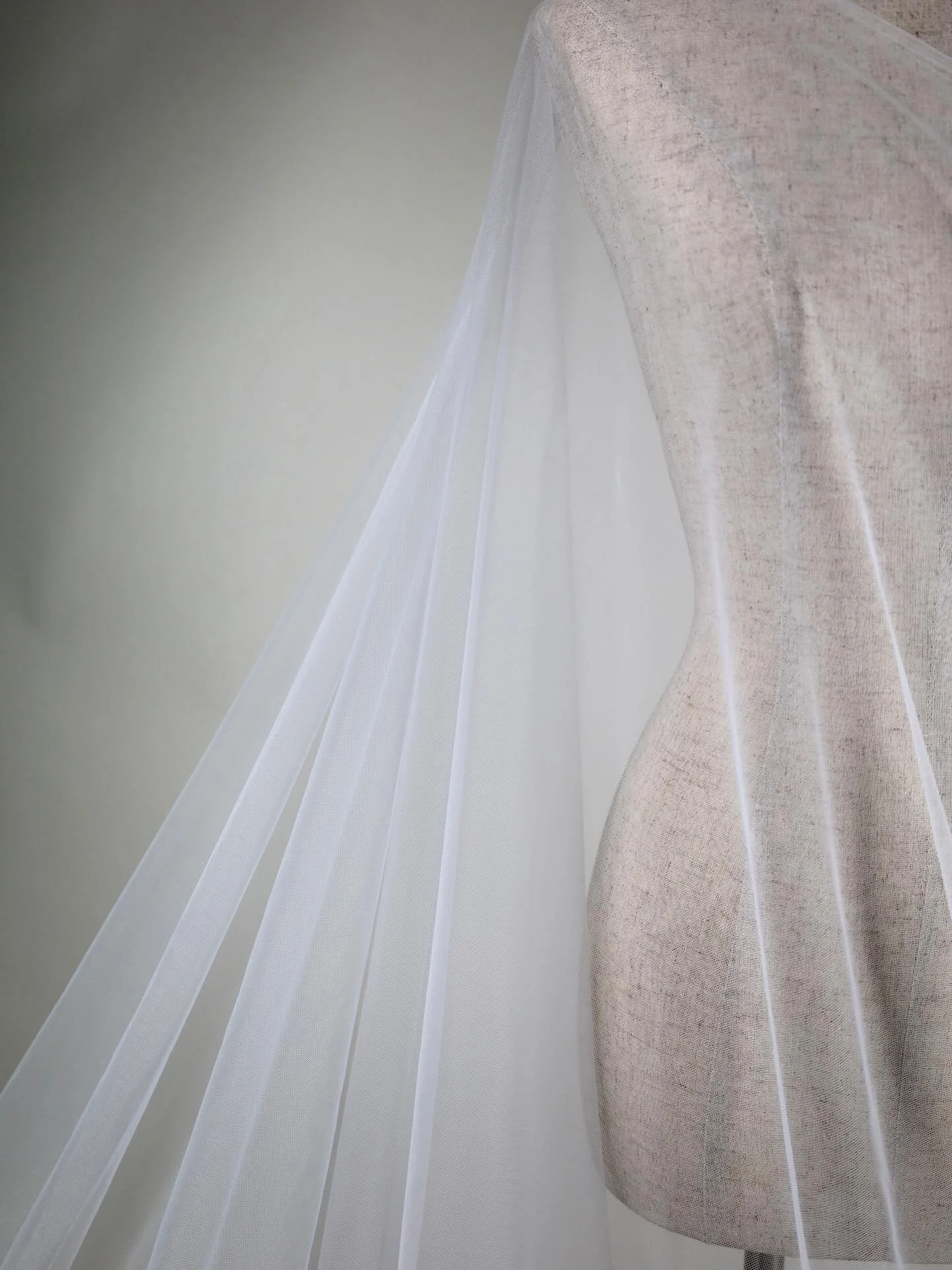 F6617 &middot; &ldquo;Tutti Tulle&rdquo; &middot; Silk White &middot; 300cm Width

Now stocking this strong, nylon, hexagonal tulle, offering excellent structure while remaining light and airy. Ideal for veils, petticoats, and dramatic layered design