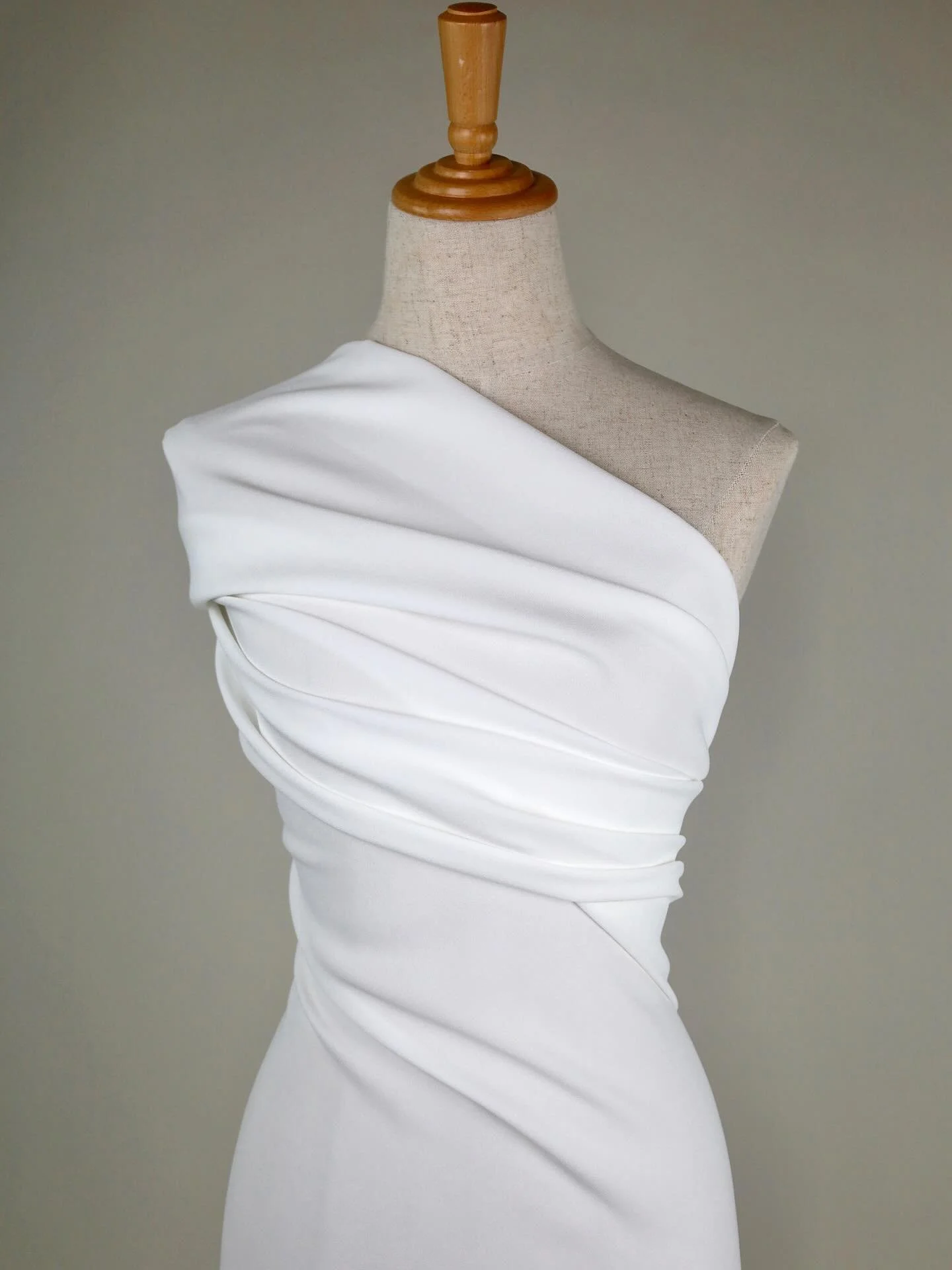 New Product
F8012 &ndash; Italian Eco Stretch Crepe in Ivory

Heavyweight crepe with a luxurious drape and a cool, soft handle. This Italian quality offers fluidity with the added comfort of two-way stretch, ideal for elegant bridal gowns.

135cm wid