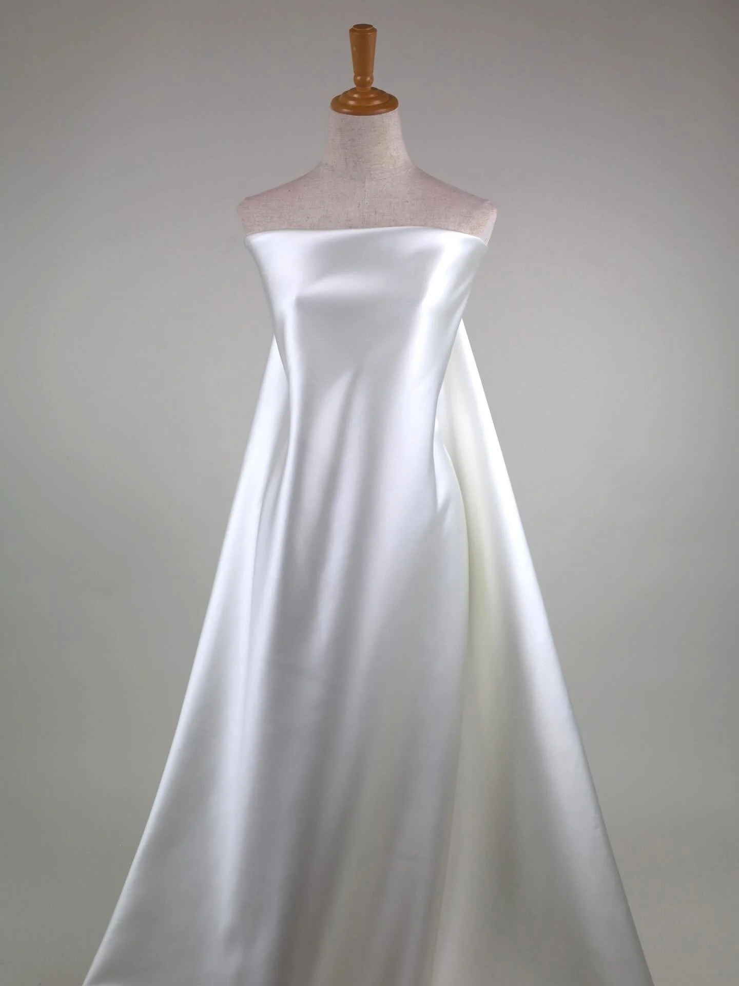 NEW COLOUR
F8981 Structured Satin &middot; Ivory

One of our best sellers, now available in Ivory &mdash; a beautiful contemporary shade that feels fresh, refined, and perfectly suited to modern bridal.

F8981 is a luminous structured satin with scul